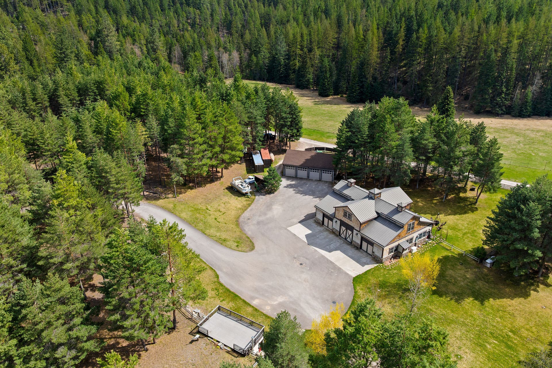 310 Rocky Woods Lane, Bigfork, MT 59911 Barndominium, detached garage/shop, underground shooting range