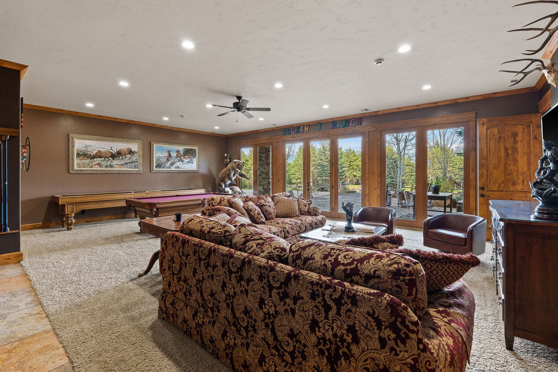 310 Rocky Woods Lane, Bigfork, MT 59911 Access to lower level stone patio