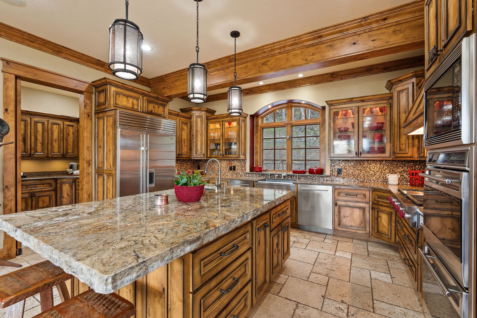 310 Rocky Woods Lane, Bigfork, MT 59911 Knotty alder cabinets with rubbed bronze fixtures