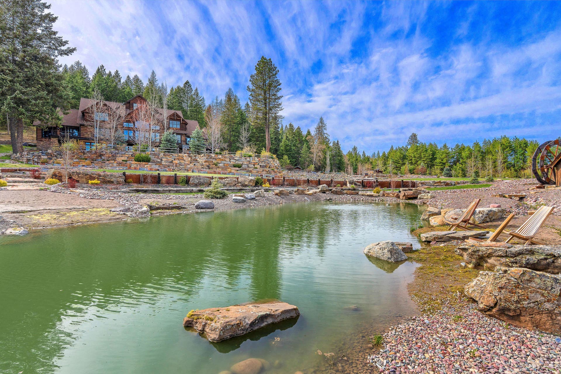 310 Rocky Woods Lane, Bigfork, MT 59911 Designed beach entry and deep-water area for swimming and recreation