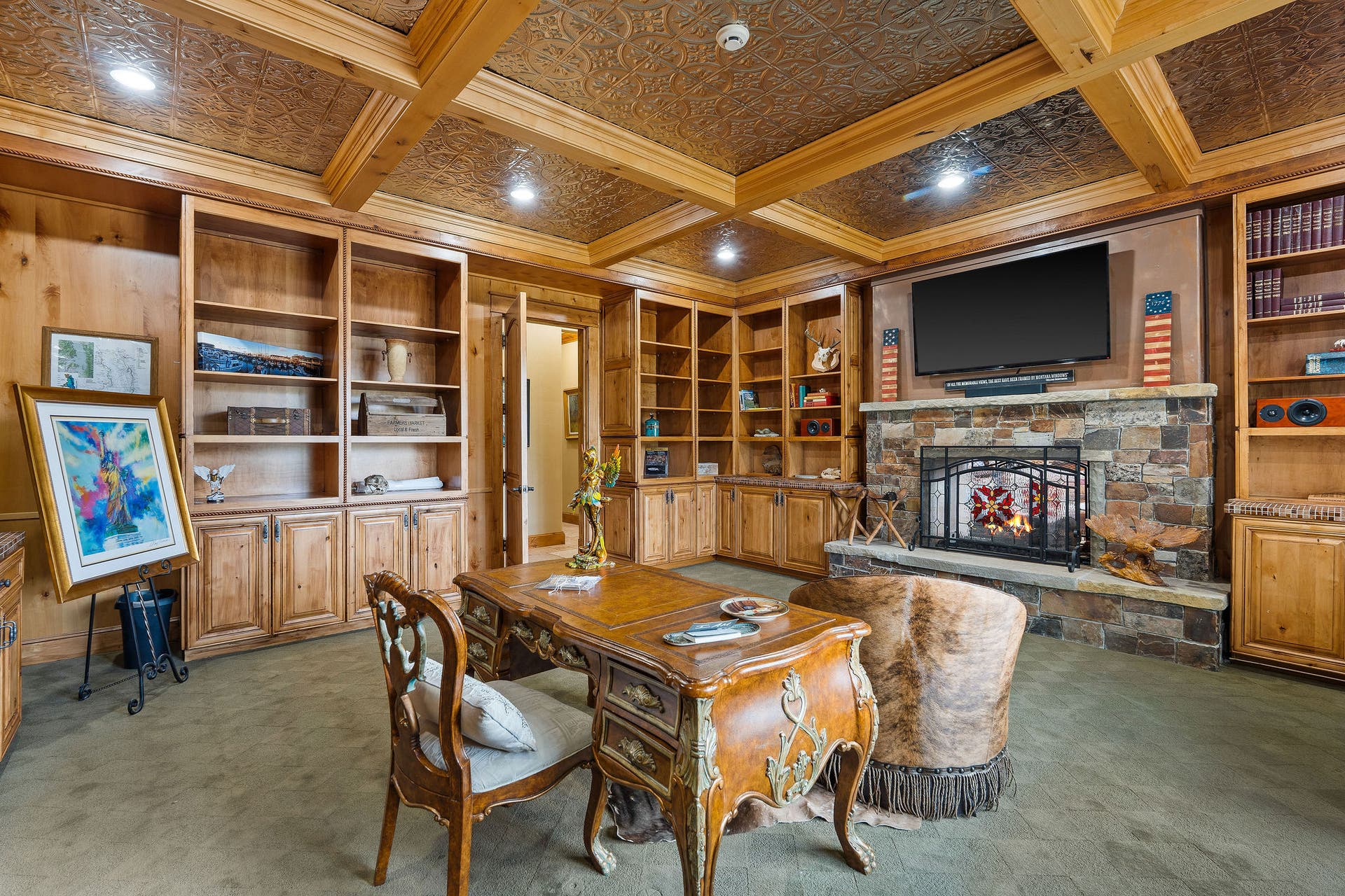 310 Rocky Woods Lane, Bigfork, MT 59911 Custom coffered ceiling, see through fireplace connects to Great Room