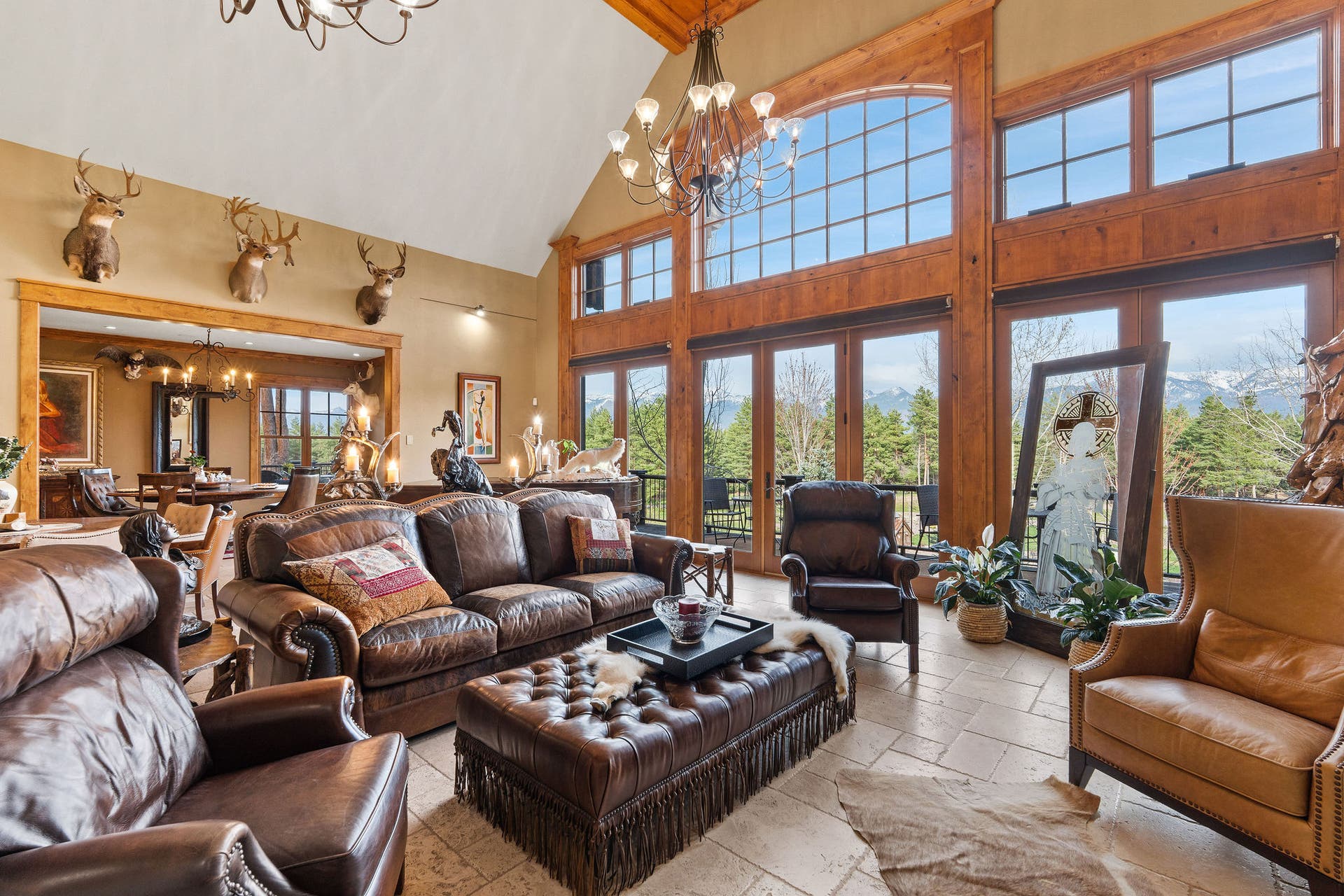 310 Rocky Woods Lane, Bigfork, MT 59911 Two chandeliers with motorized lifts, track lighting for artwork