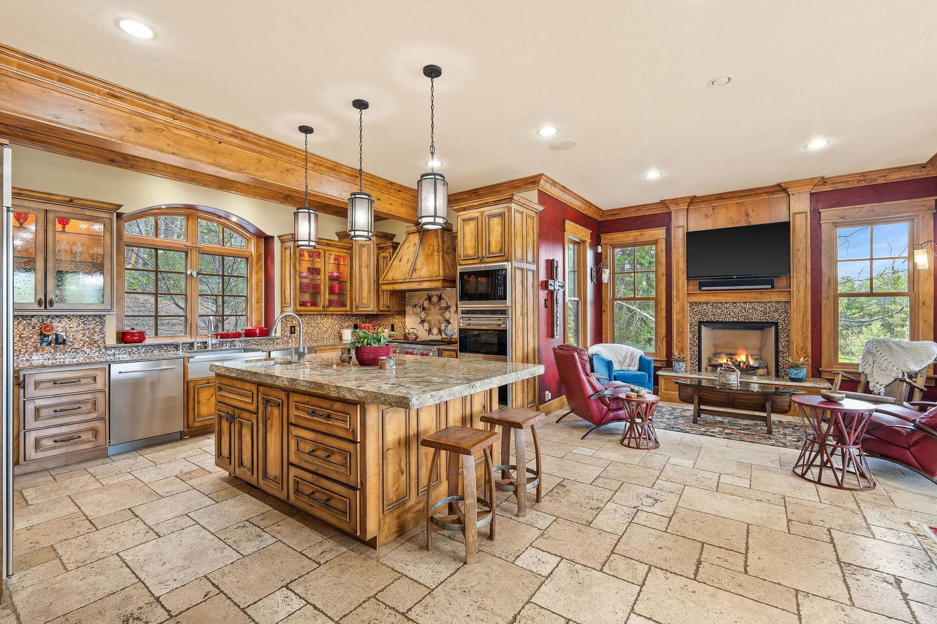 310 Rocky Woods Lane, Bigfork, MT 59911 Oversized island with rough edge granite countertops & bar seating