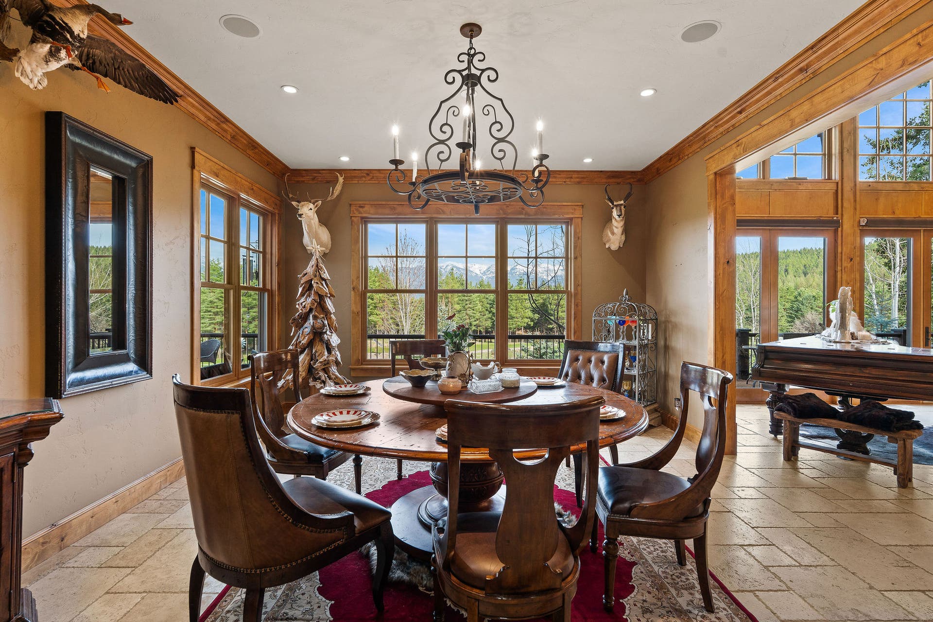 310 Rocky Woods Lane, Bigfork, MT 59911 Large windows capture Swan Mountain Range views