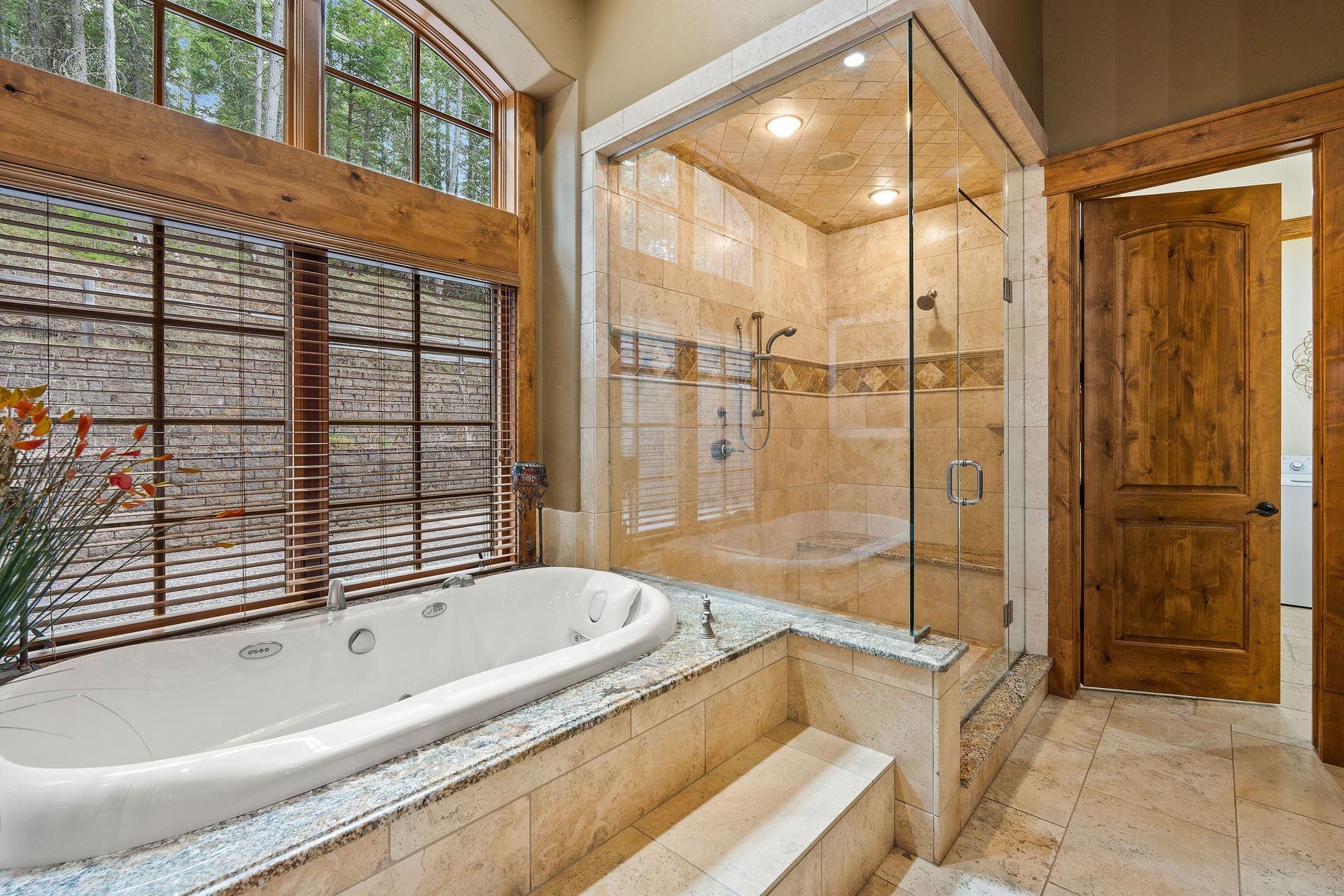 310 Rocky Woods Lane, Bigfork, MT 59911 Steam shower with long bench and dual shower heads