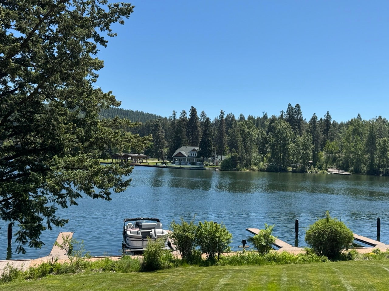 Waterfront setting featuring dual dock structures
