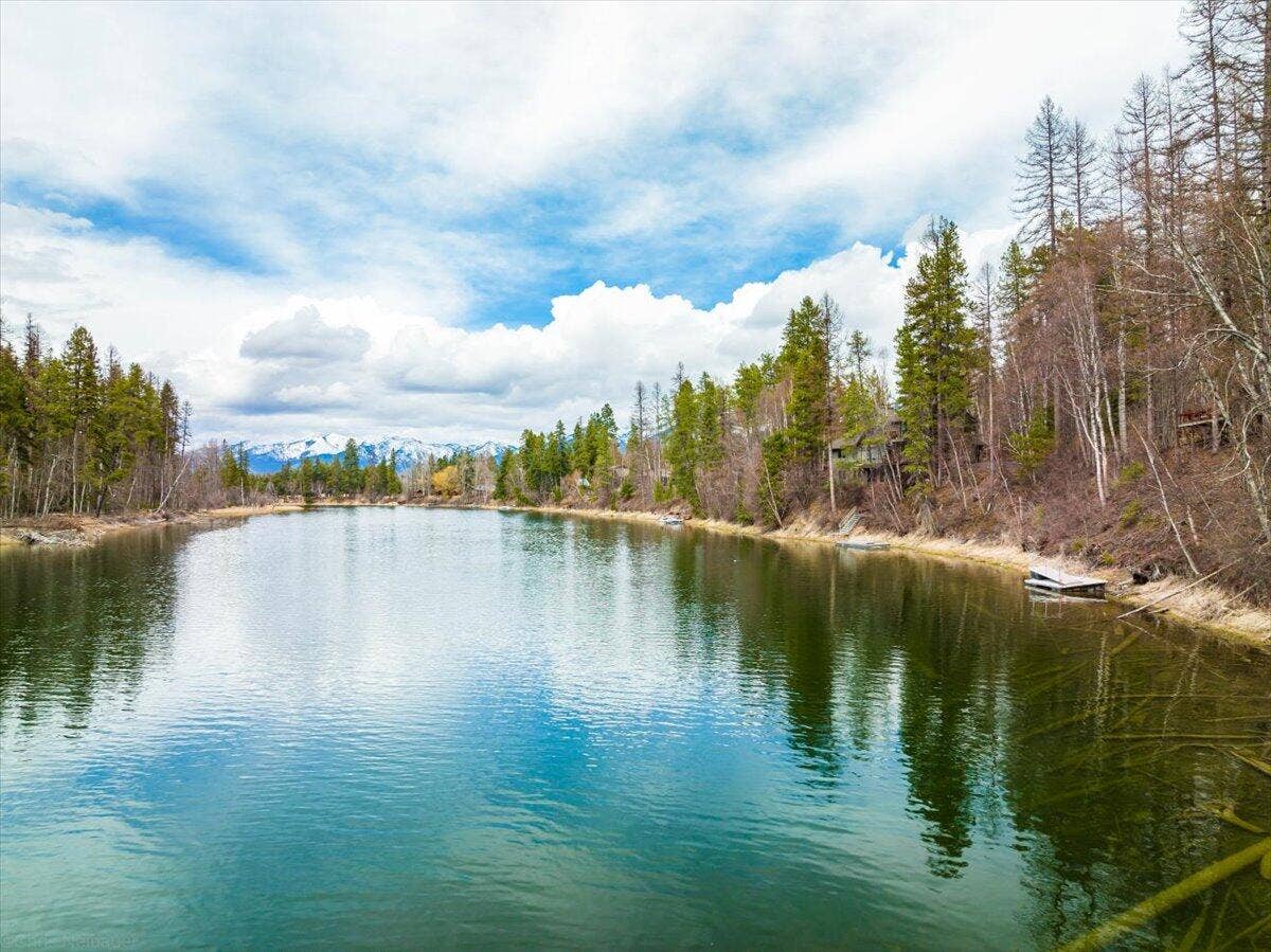 518 Eastman Drive, Bigfork, MT 59911 Imagine relaxing and floating along the calm waters of the Swan River.
