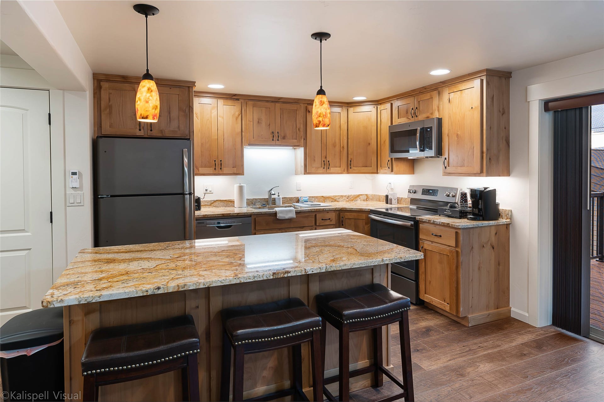 425 Grand Drive, Bigfork, MT 59911 Unit E Kitchen with granite counters
