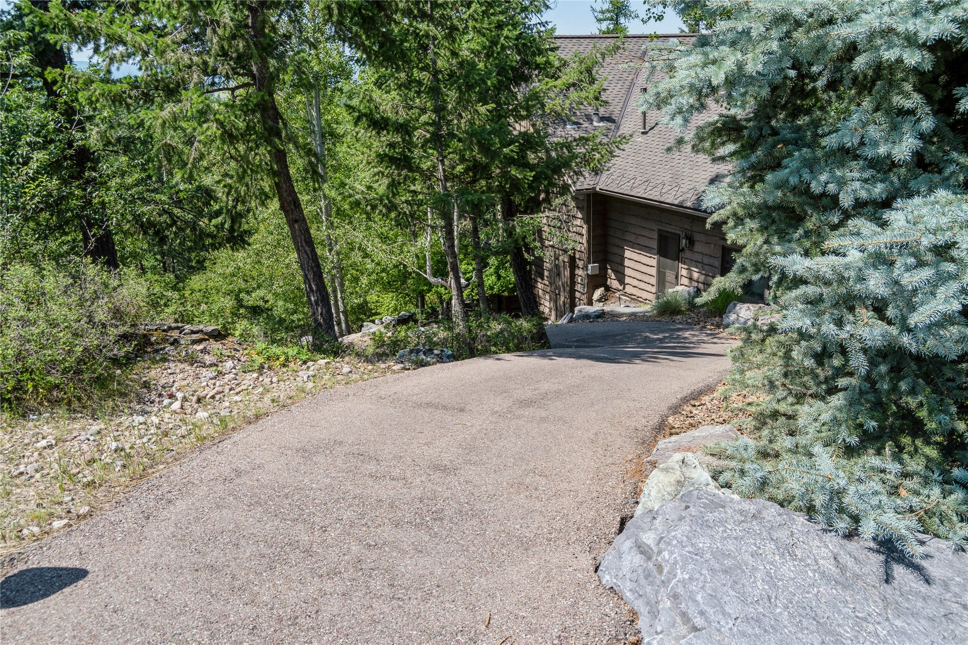 44 Rock Ridge Way, Bigfork, MT 59911 Homeowners' path to Eagle Bend Golf Course