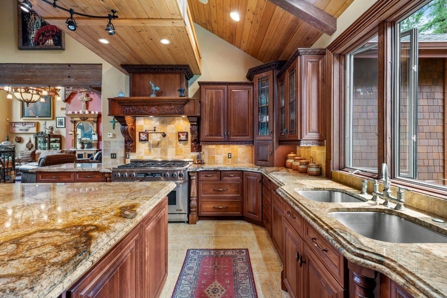 940 McCaffery Road, Bigfork, MT 59911 Kitchen w/2 dishwashers; professional range; warming drawers