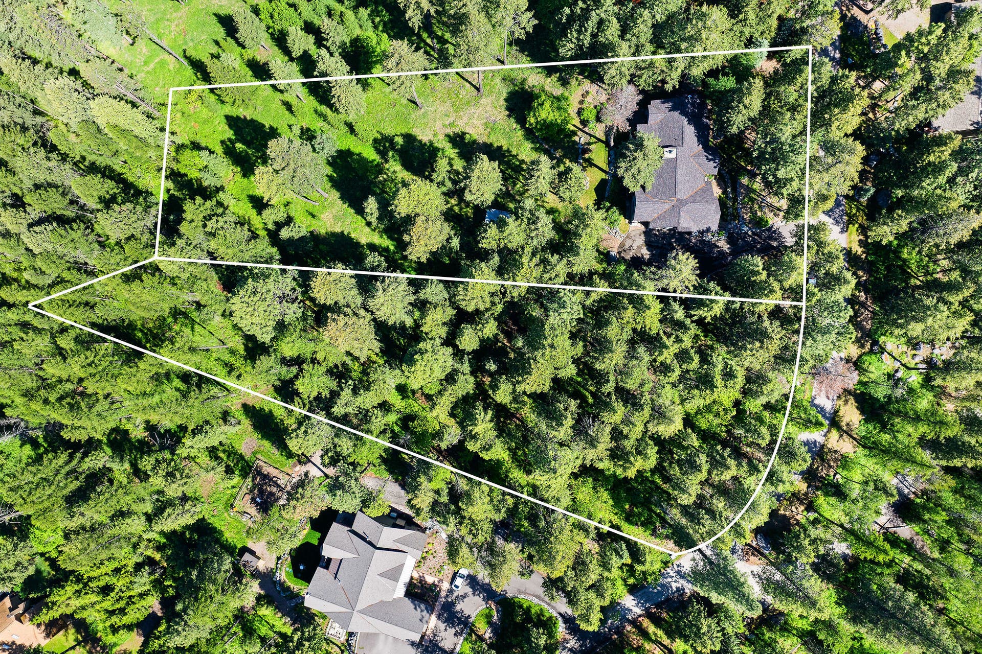 599 Pommel Drive, Bigfork, MT 59911 Home and adjacent lot - Lines are for reference only. Not a legal representation of actual property lines.