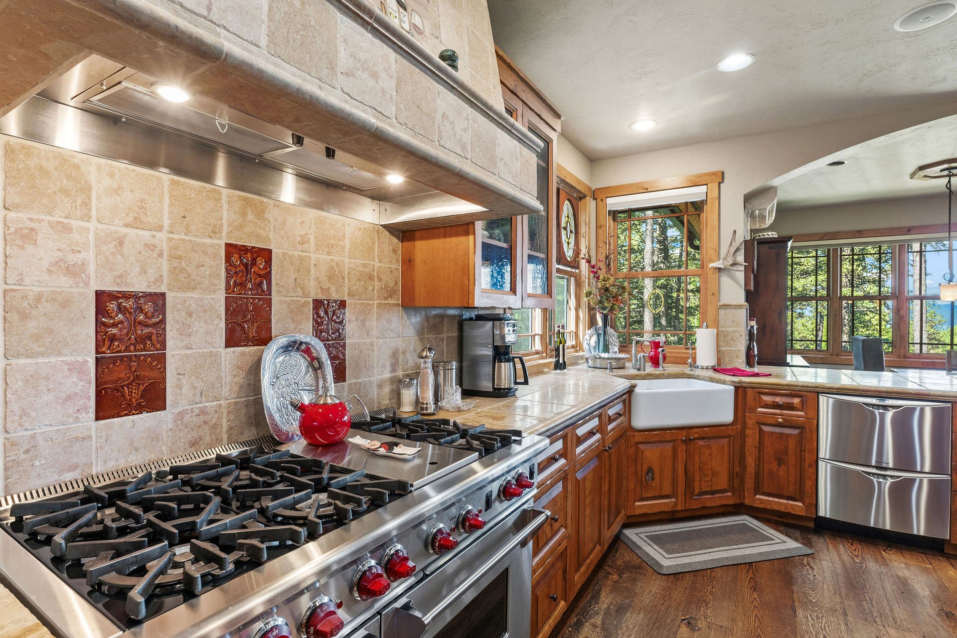 599 Pommel Drive, Bigfork, MT 59911 Professional grade, gas, Wolf range, farmhouse sink, and stacked drawer dishwasher