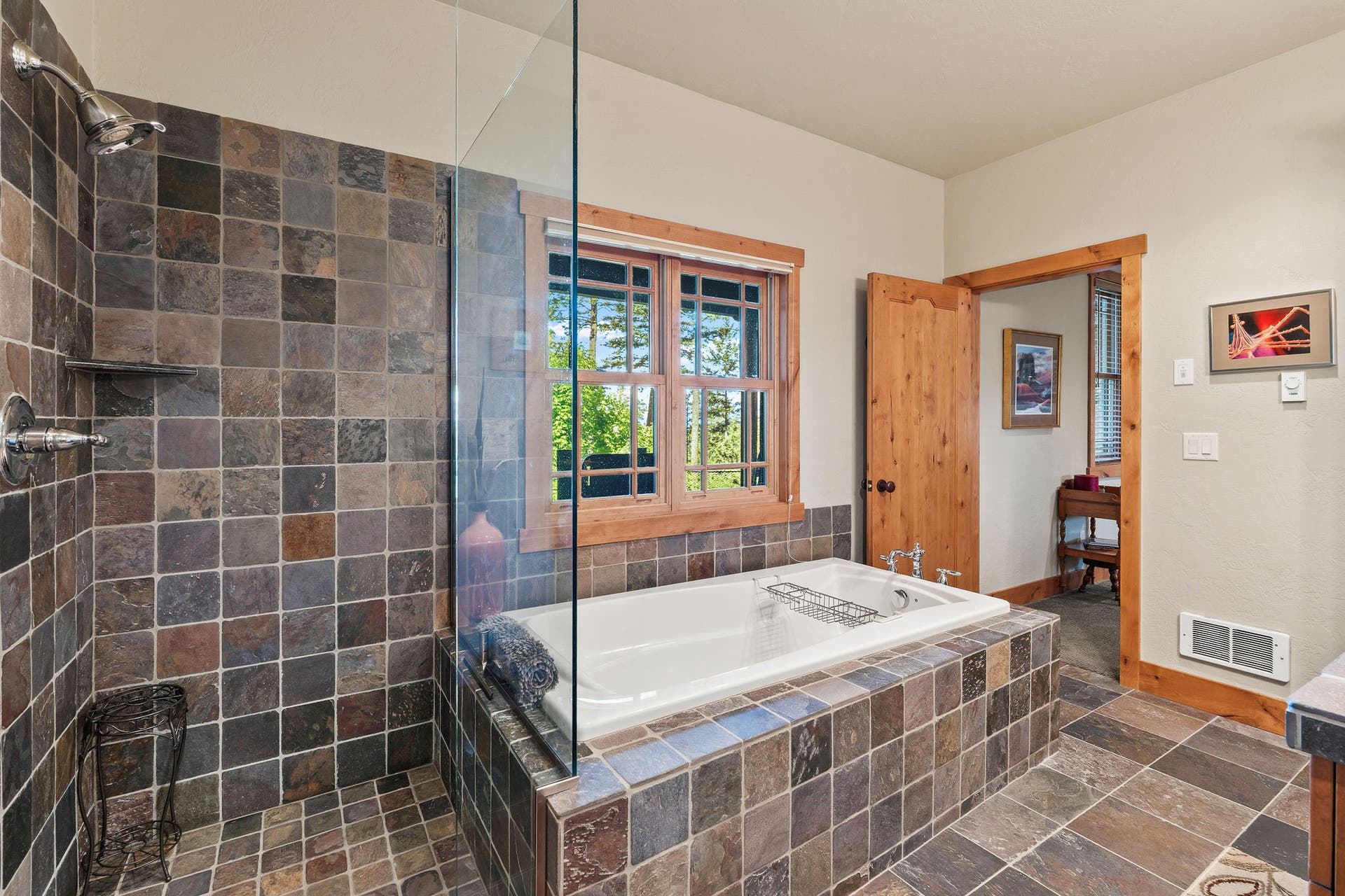 599 Pommel Drive, Bigfork, MT 59911 Lower level ensuite with soaking tub and stand up shower