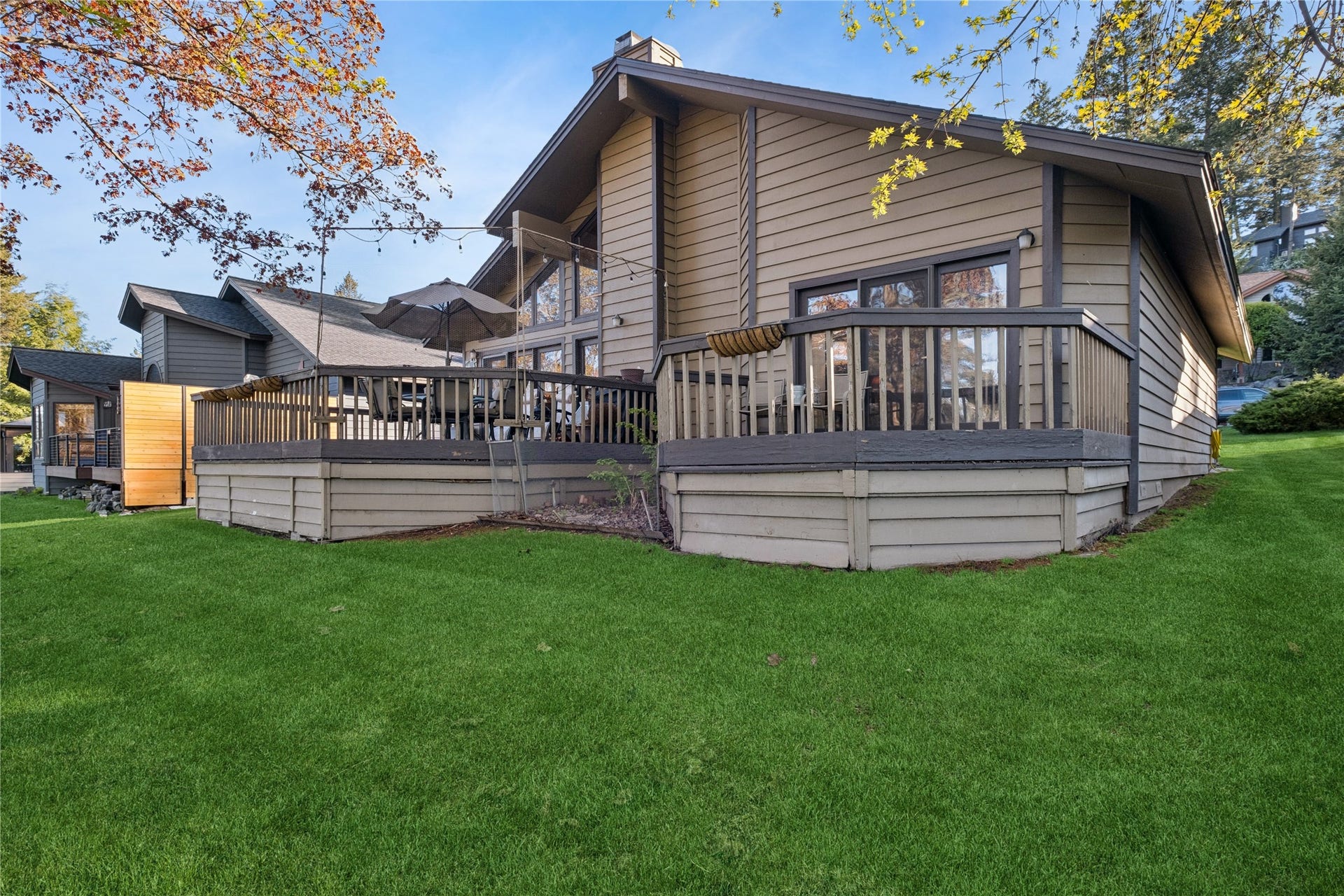 85 Golf Terrace, Bigfork, MT 59911 Deck from off the living room and the primary bedroom