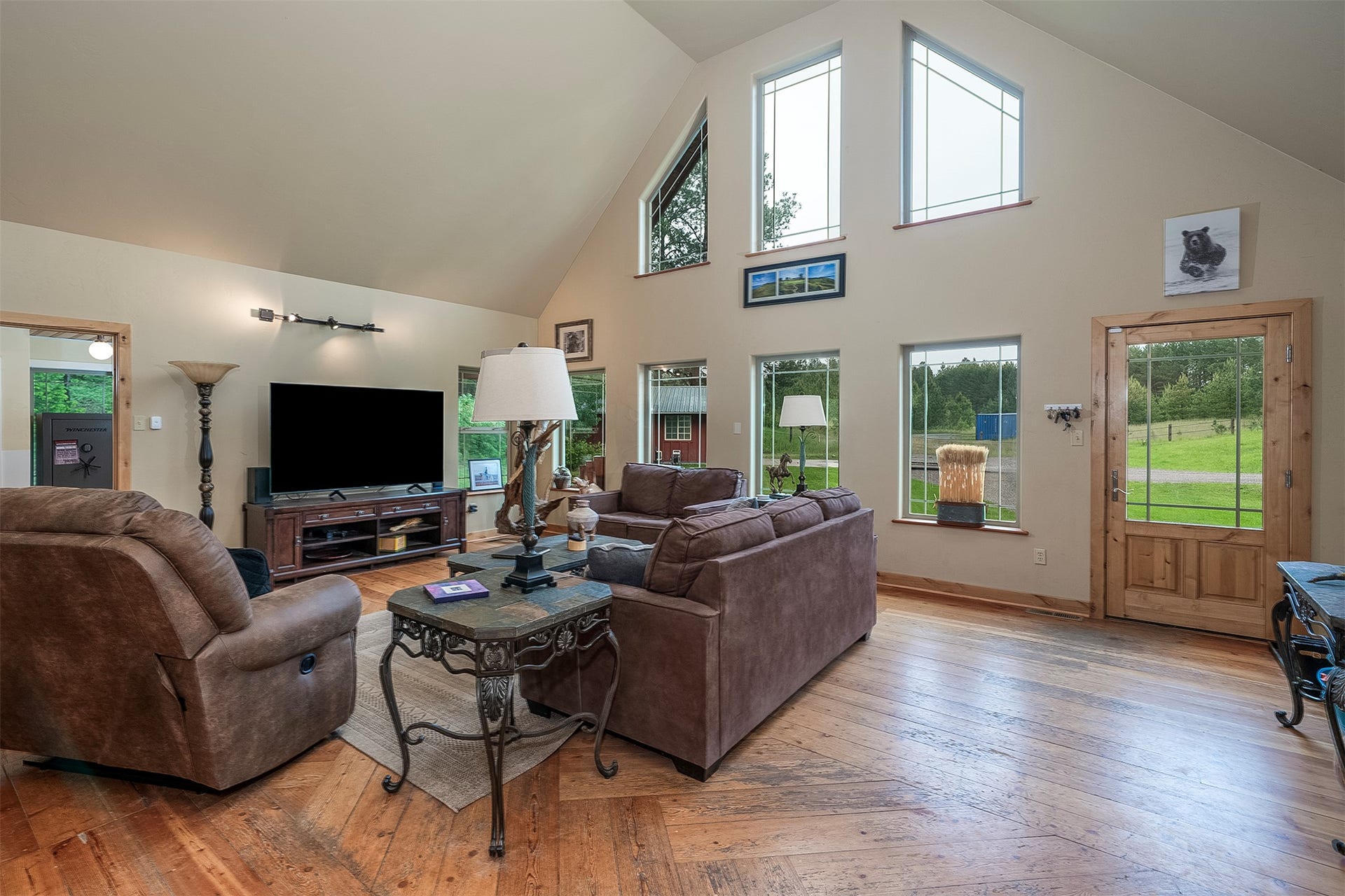 777 Mt Highway 83, Bigfork, MT 59911 Vaulted ceiling featuring multiple windows for abundant natural light