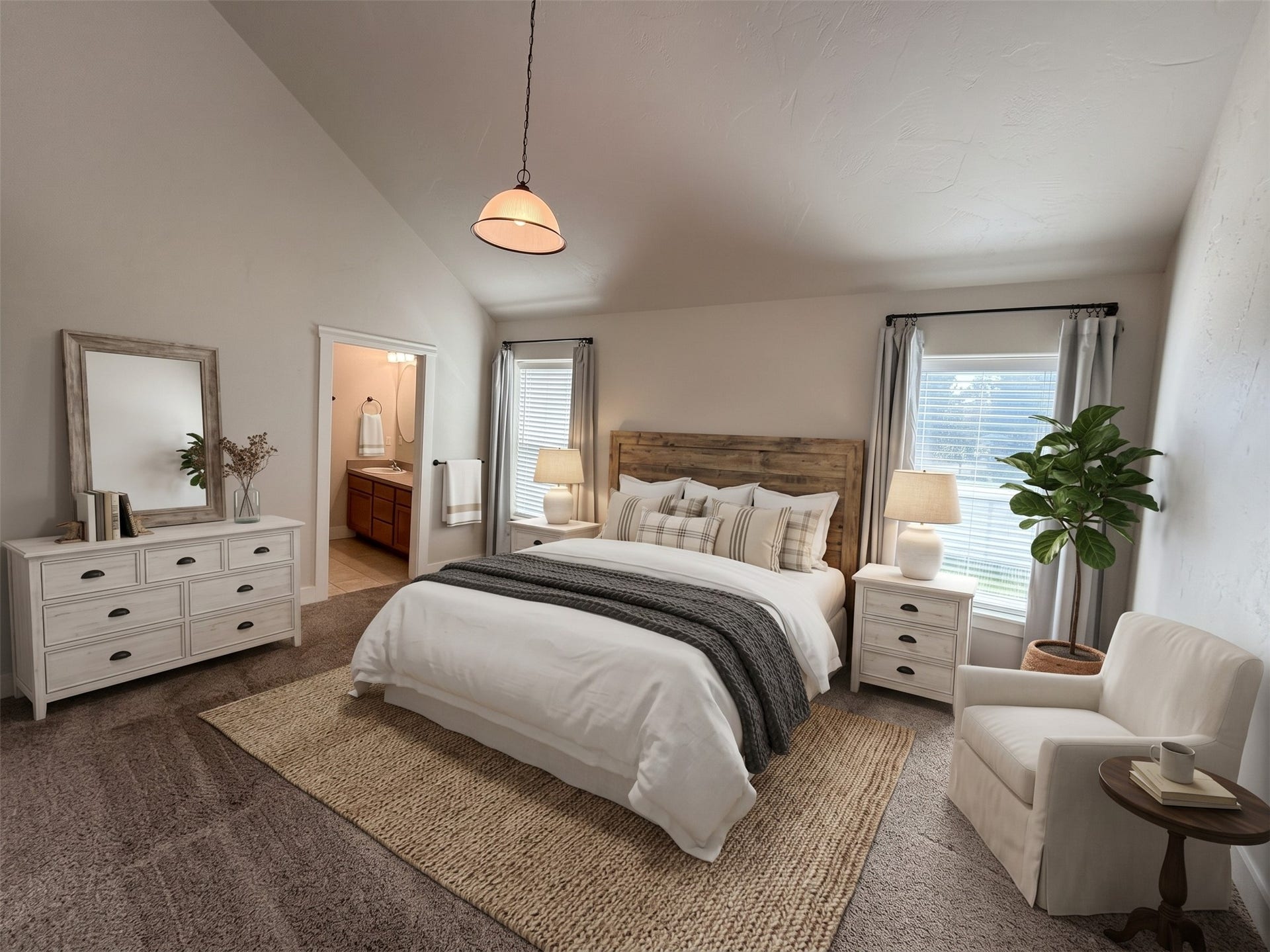 2 Empire Loop, Kalispell, MT 59901 Virtually staged spacious primary suite bedroom with walk-in closet in a 3-bedroom North Kalispell townhome.