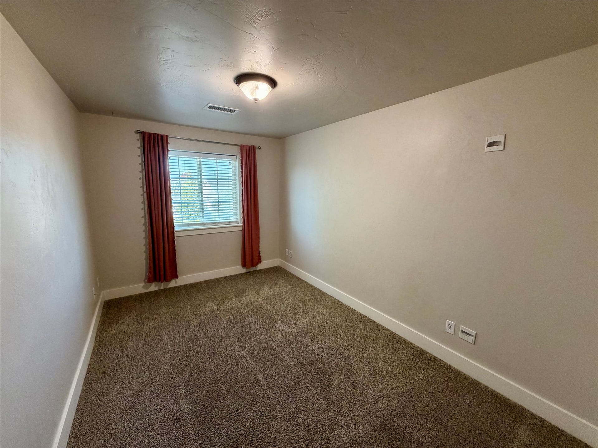 2 Empire Loop, Kalispell, MT 59901 Bright and versatile second bedroom, spacious and open.