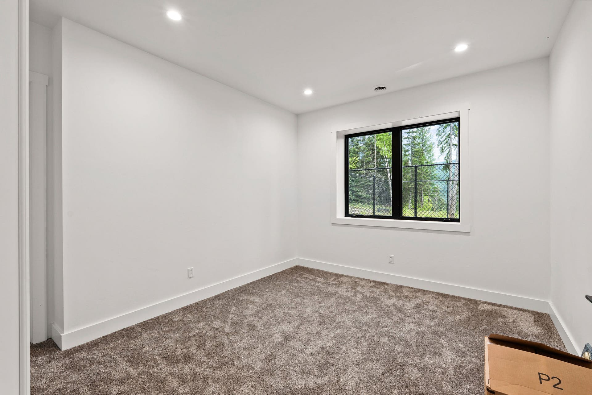 14051 Big Rock Way, Bigfork, MT 59911 Lower Level Guest Bedroom #2: 9'6" ceilings, walk-in closet