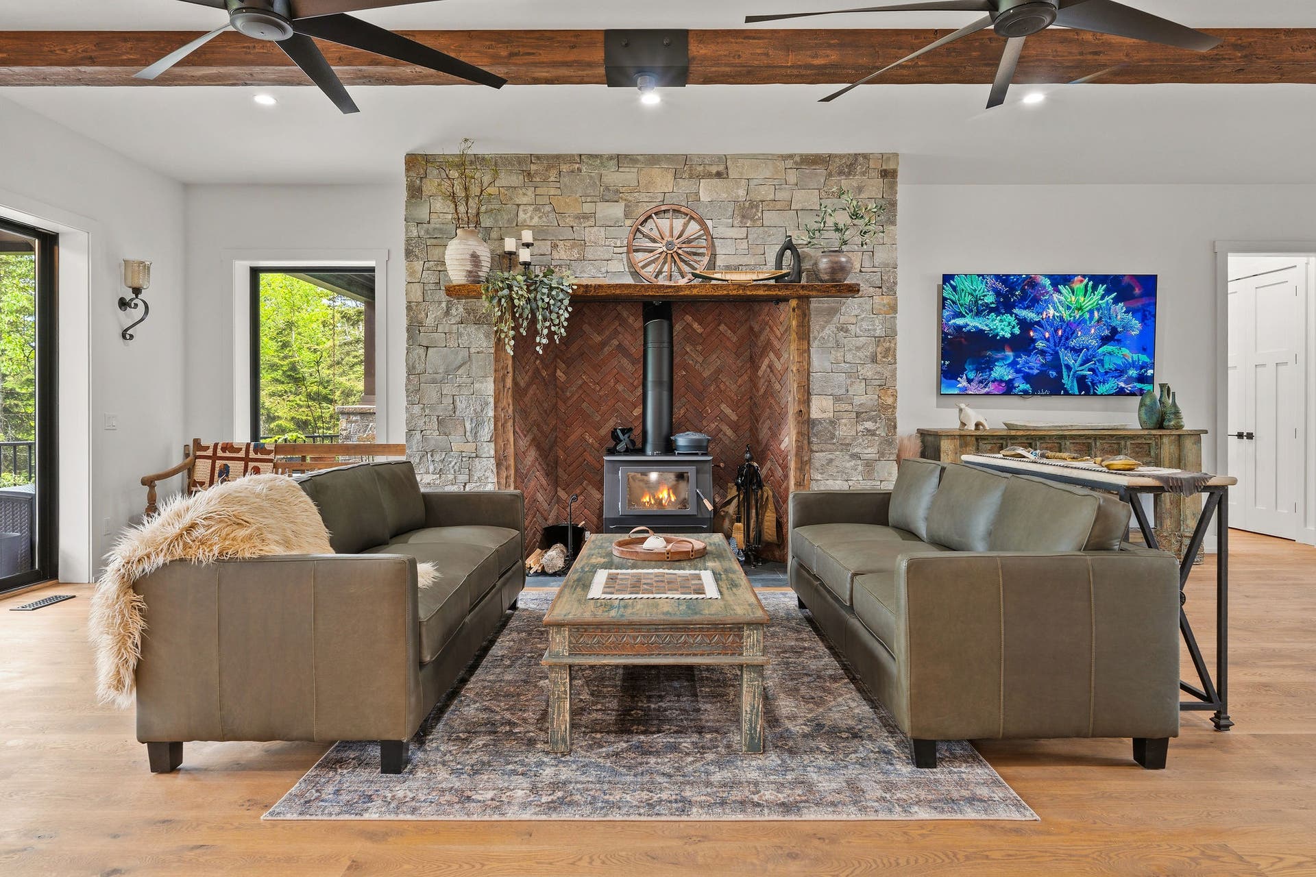 14051 Big Rock Way, Bigfork, MT 59911 Wood stove w/ basalt brick and MT stone surround, custom wood mantle