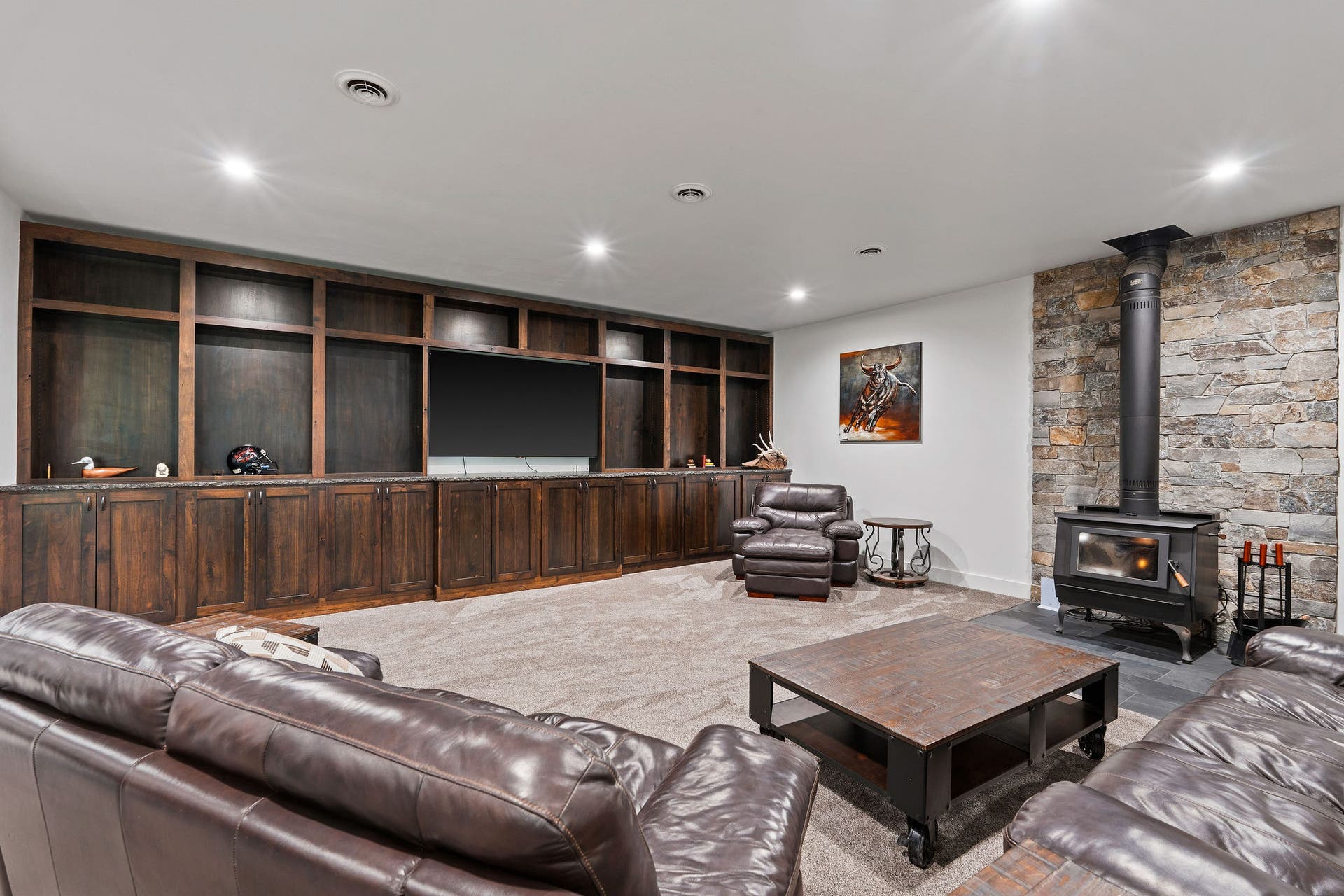 14051 Big Rock Way, Bigfork, MT 59911 Entertainment center large walnut custom-built shelving and cabinets 24 long