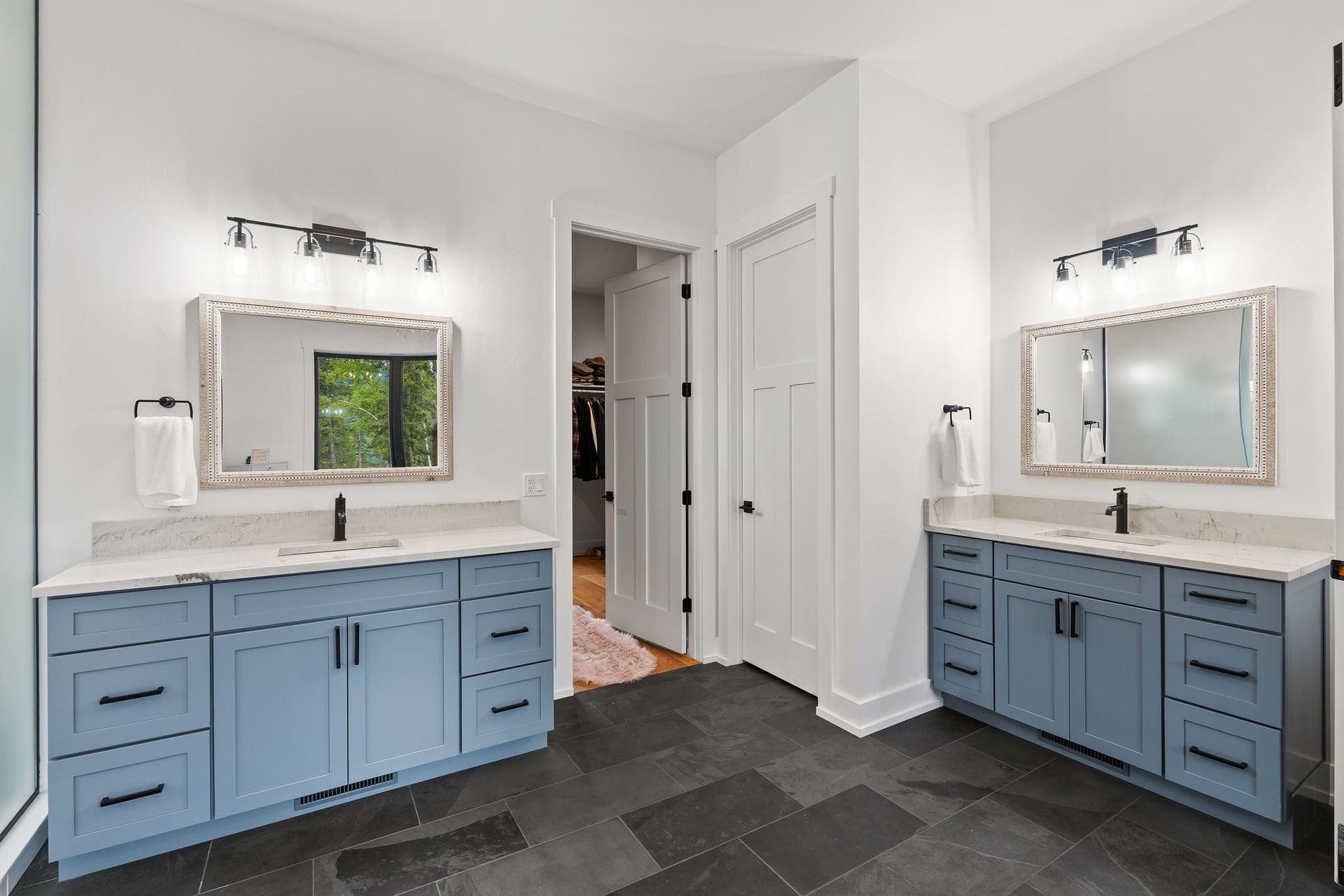 14051 Big Rock Way, Bigfork, MT 59911 Two single vanities with quartzite countertops