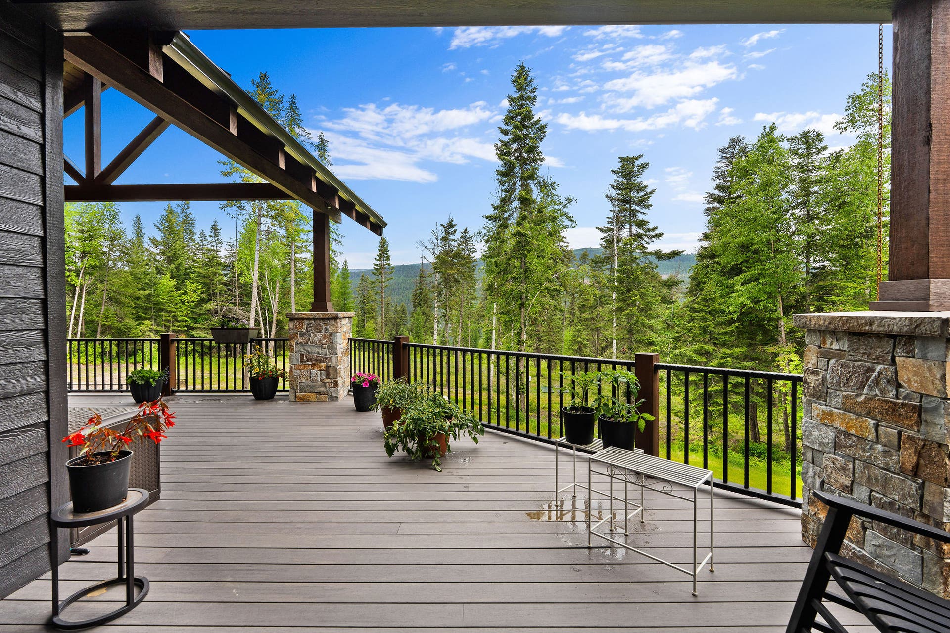 14051 Big Rock Way, Bigfork, MT 59911 Upper level Timber Trex deck with large timber frame