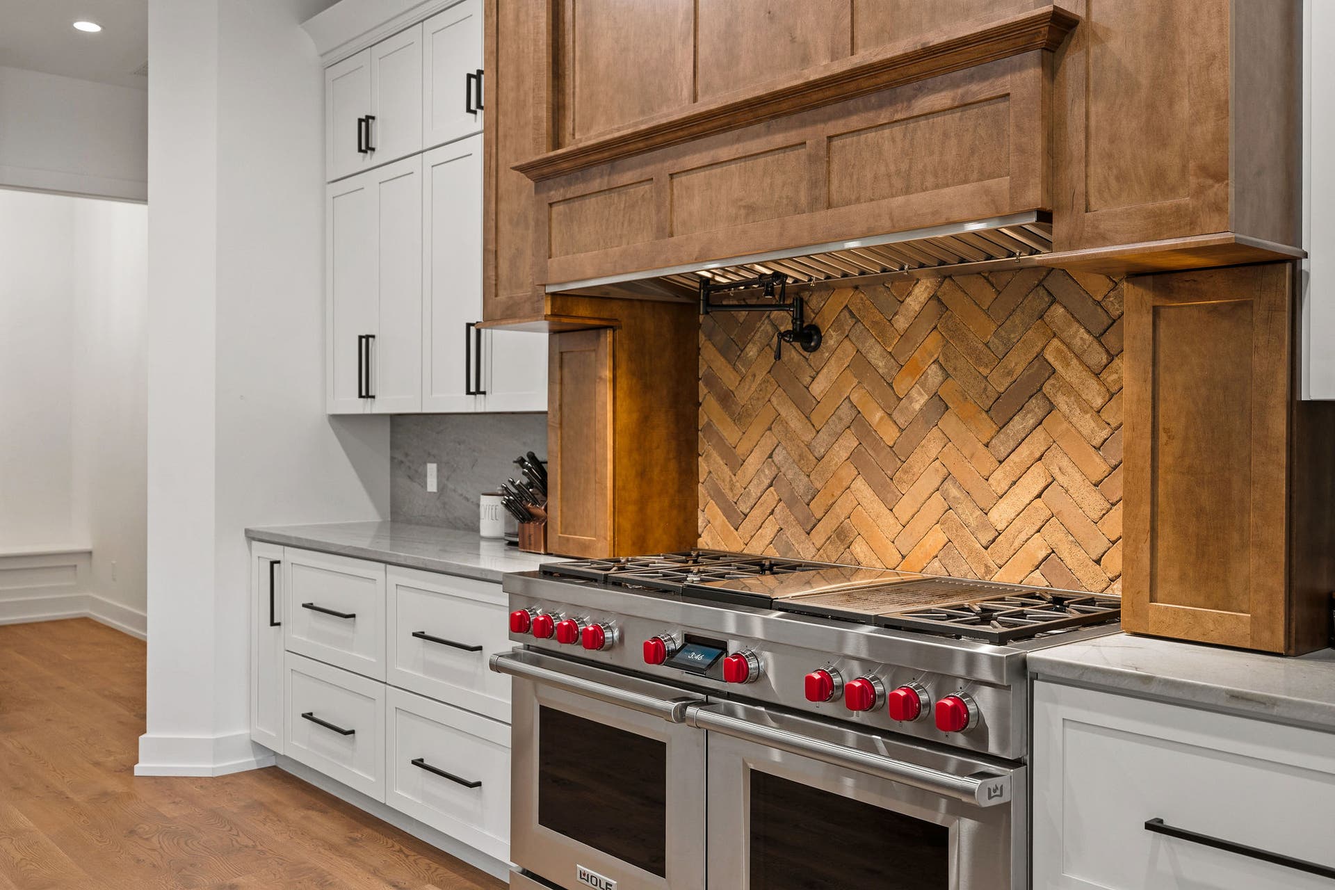 14051 Big Rock Way, Bigfork, MT 59911 Herringbone brick backsplash behind oven