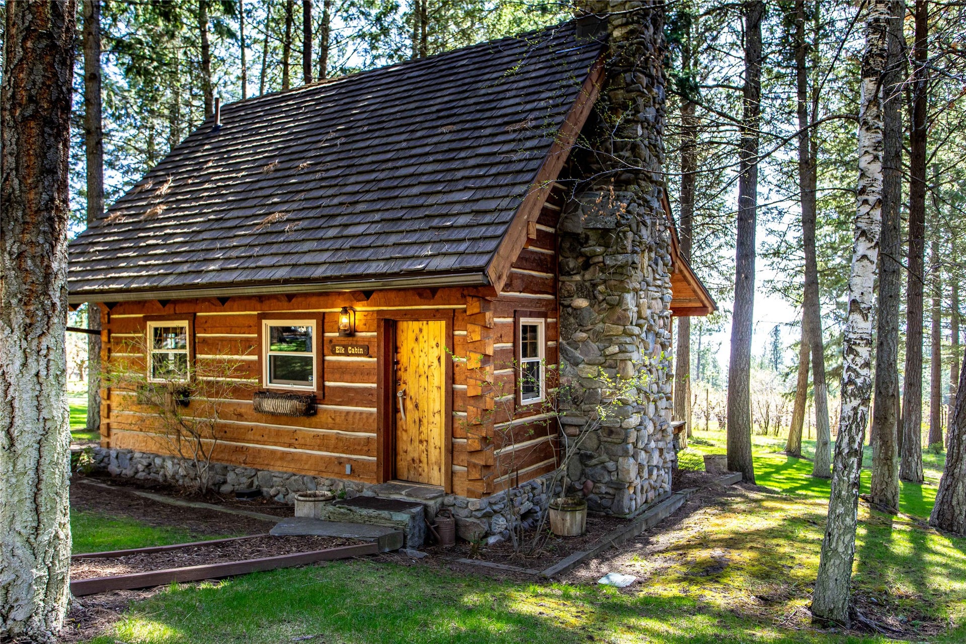 13518 Sylvan Drive, Bigfork, MT 59911 Elk Cabin with covered deck