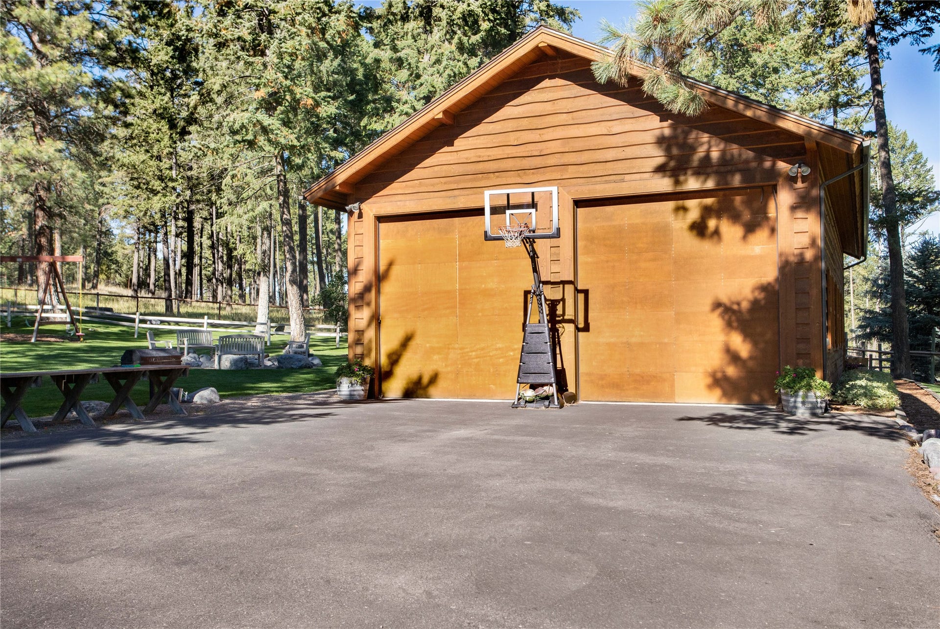 13518 Sylvan Drive, Bigfork, MT 59911 Spacious garage, large doors ideal for hosting events