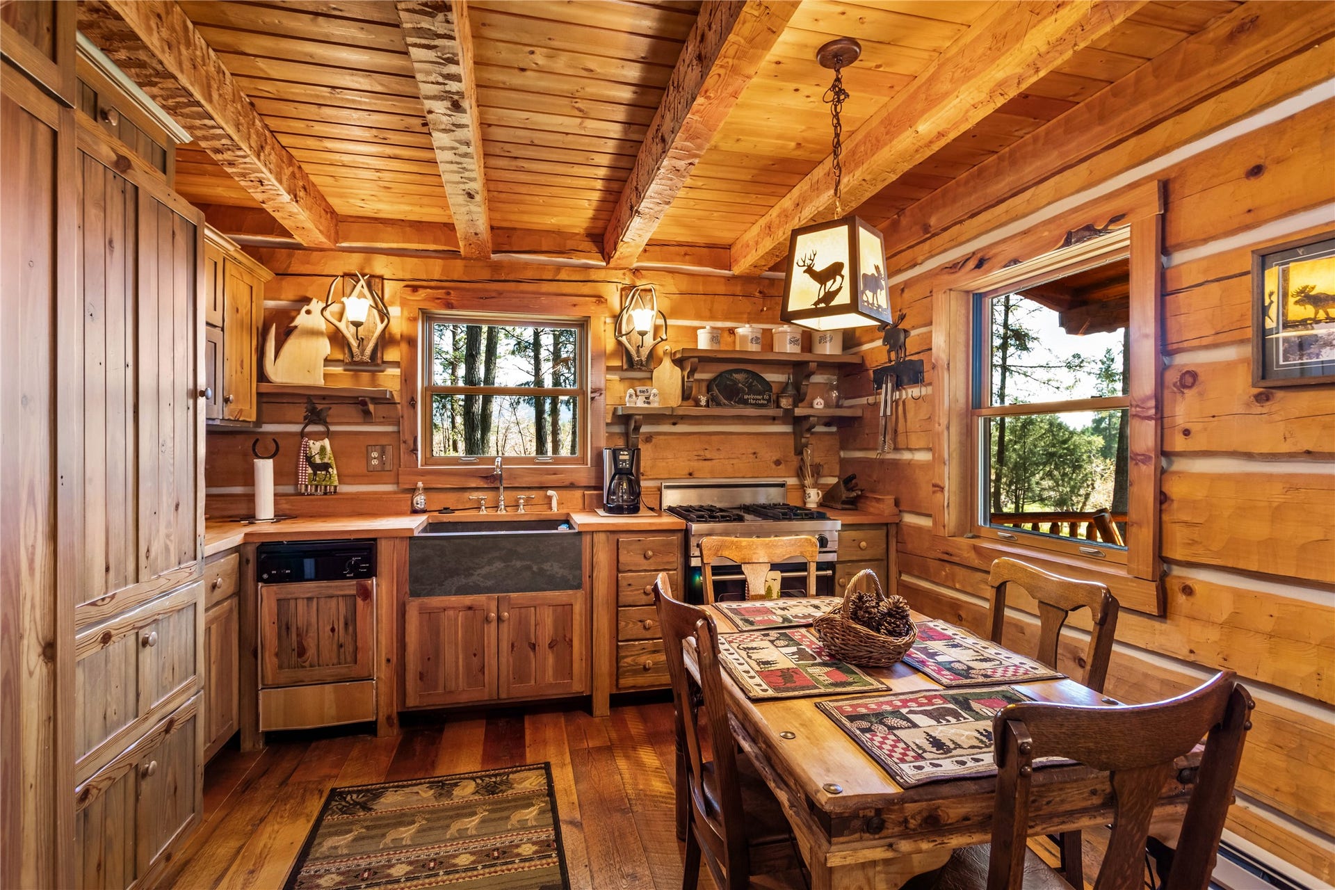 13518 Sylvan Drive, Bigfork, MT 59911 Elk Cabin kitchen with Viking gas range & farmhouse sink