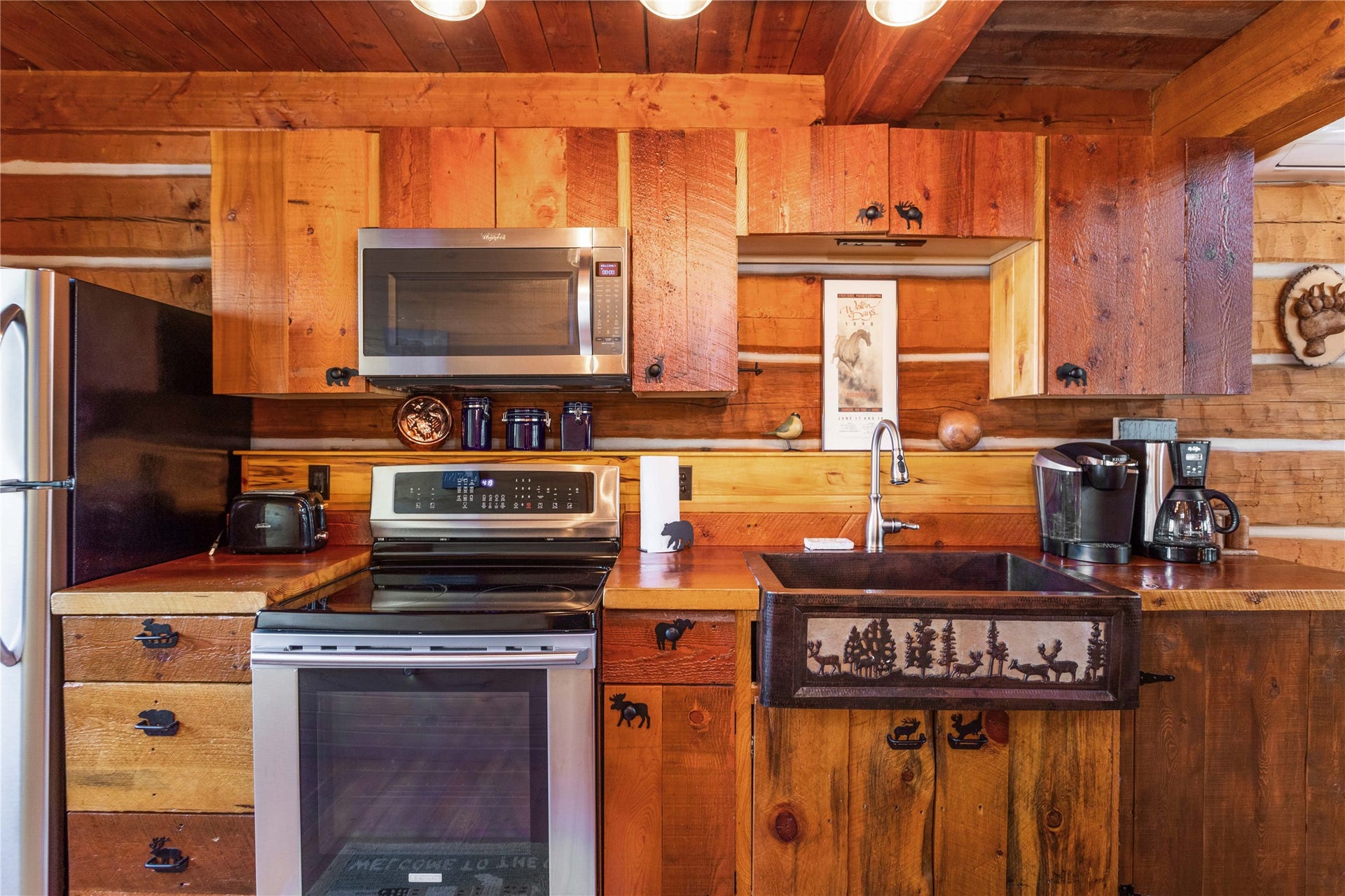 13518 Sylvan Drive, Bigfork, MT 59911 Bearly Asleep Cabin with copper sink, Flathead Lake view and garden-greenhouse access