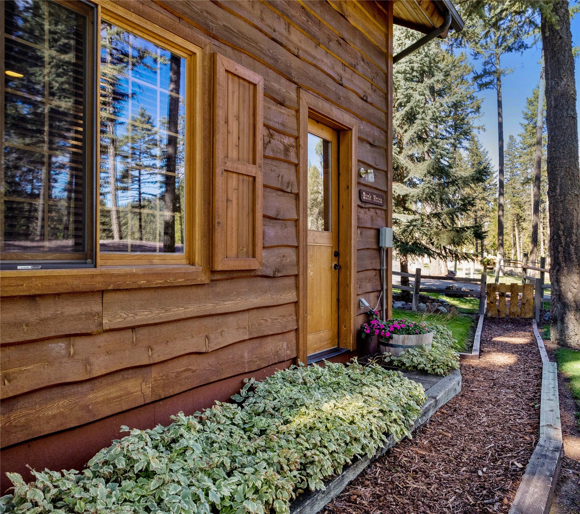 13518 Sylvan Drive, Bigfork, MT 59911 Walkway to Bunk House off garage