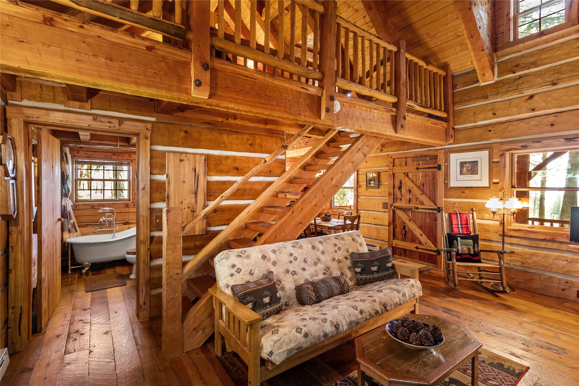 13518 Sylvan Drive, Bigfork, MT 59911 Elk Cabin living room with custom rock fireplace
