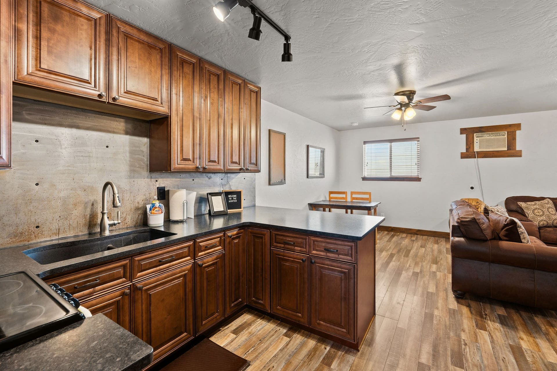 The Hunter: Full kitchen, with a full-size fridge, and dining area.
