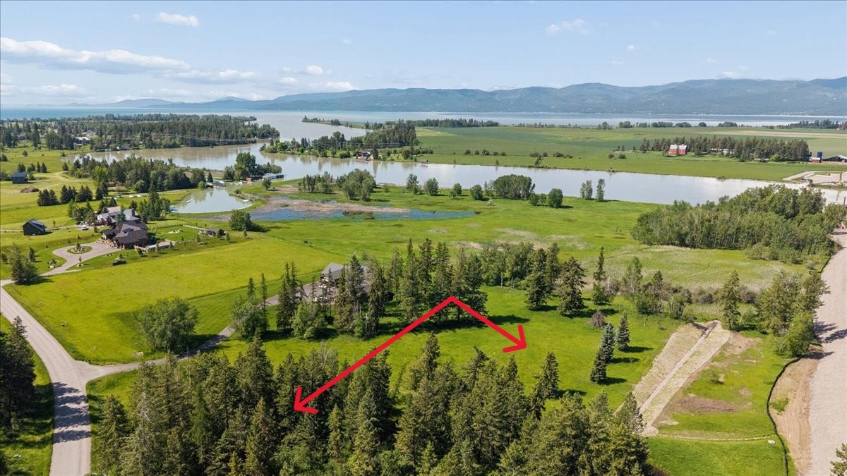 338 Hanging Rock Drive, Bigfork, MT 59911 Subject property. New Sportsman's Bridge boat launch is right across the river.