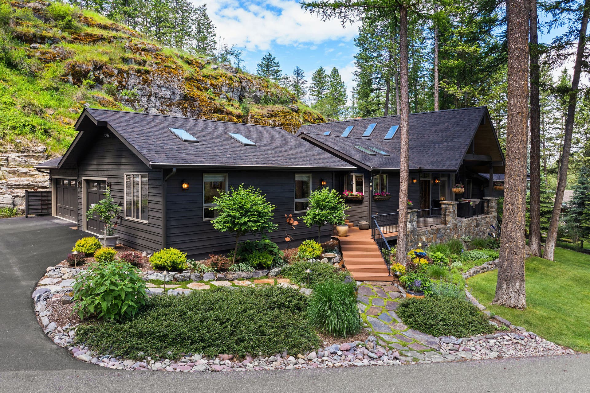 188 Eagle Bend Drive, Bigfork, MT 59911 Welcome Home! Mature landscaping and cozy front porch welcome you home