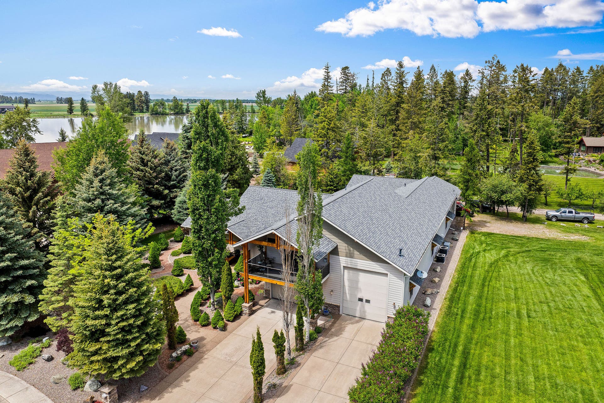 229 Harbor Drive, Bigfork, MT 59911 3BD/4BA in Eagle Bend neighborhood in close proximity to Flathead River