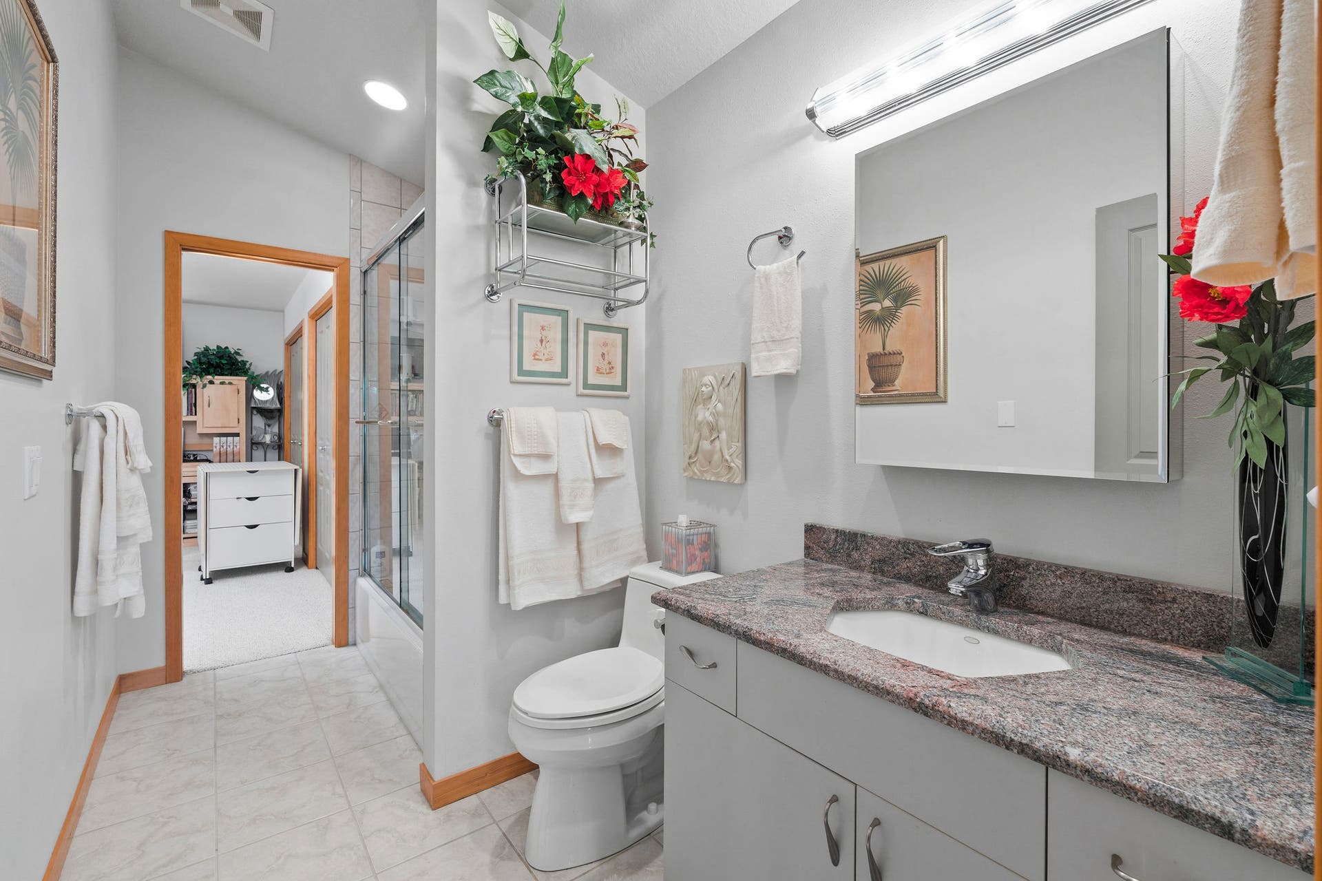 229 Harbor Drive, Bigfork, MT 59911 Upper level full bathroom with door to bedroom and theater room/bar