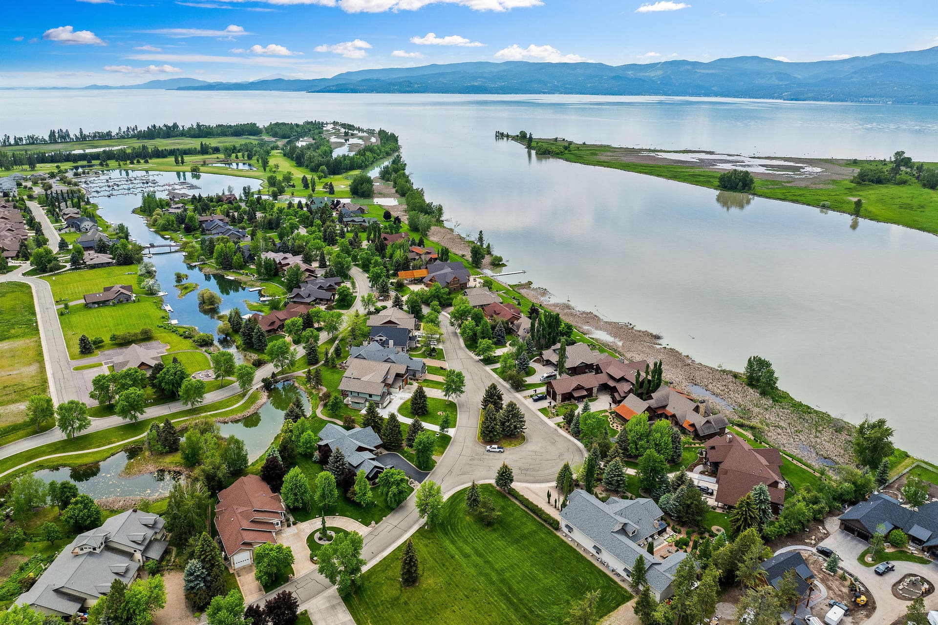 229 Harbor Drive, Bigfork, MT 59911 Flathead River and Flathead Lake steps away!