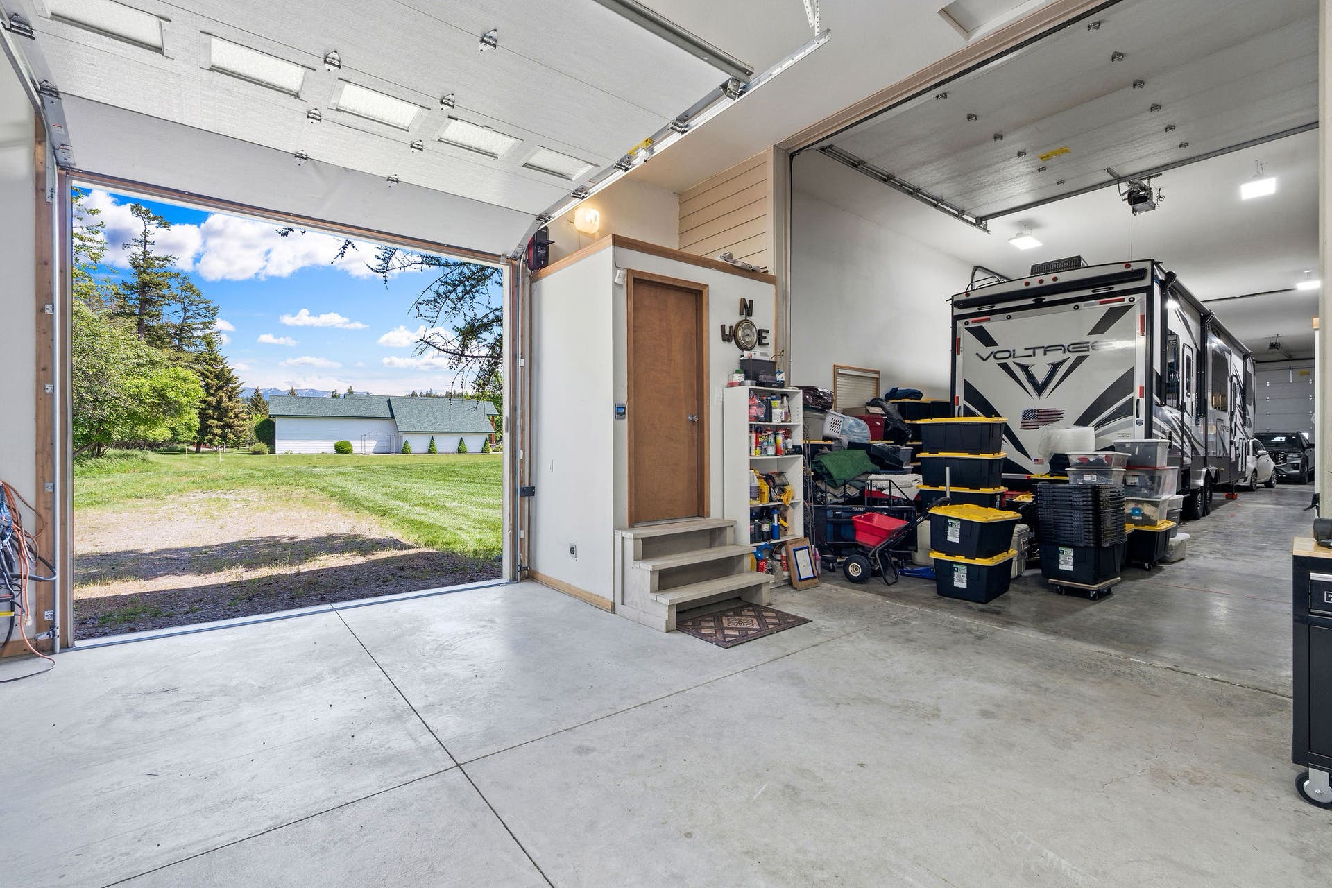 229 Harbor Drive, Bigfork, MT 59911 48x20 Garage #3 with 10x10 and 8x10 drive through style doors, 3/4 bath