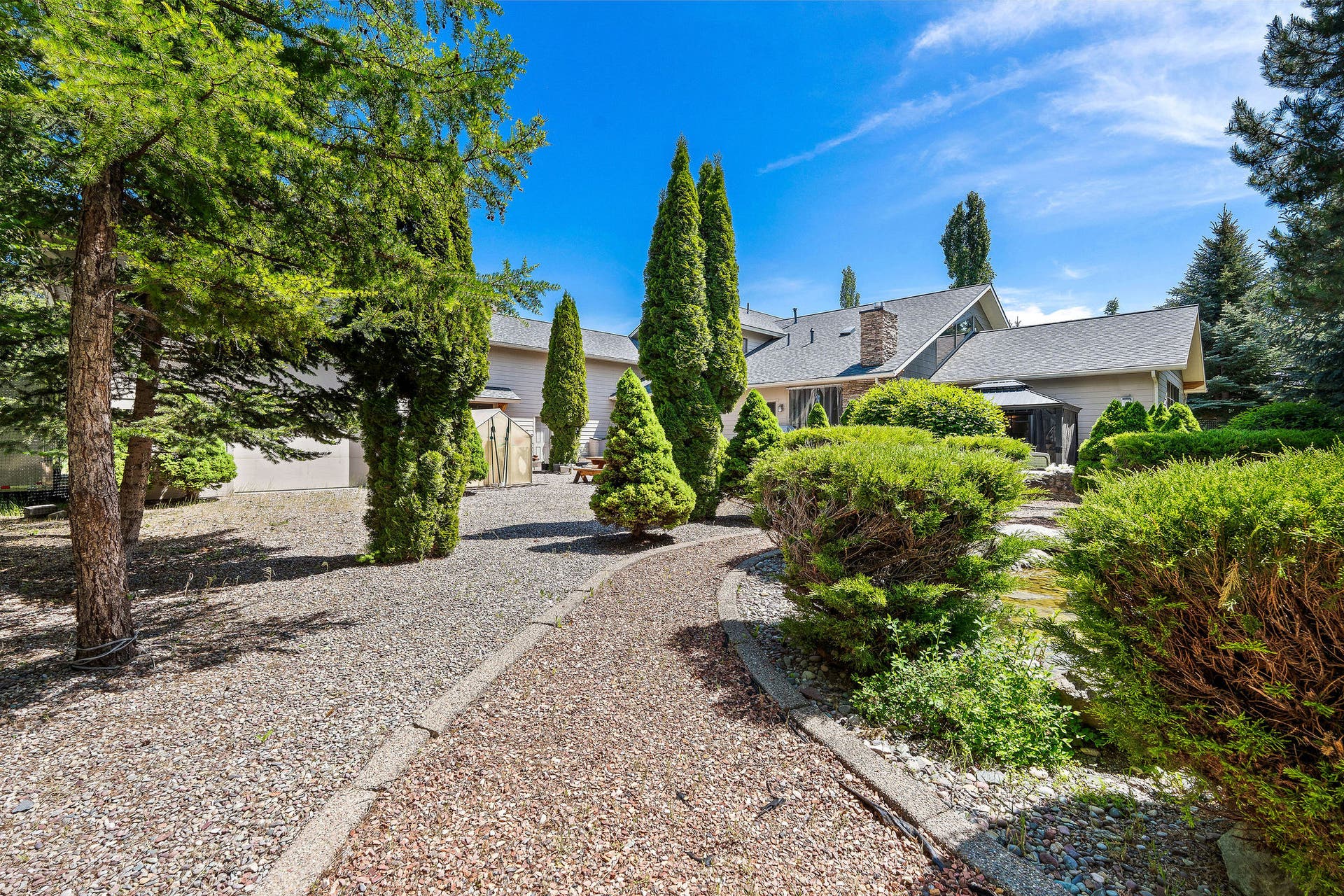 229 Harbor Drive, Bigfork, MT 59911 Beautifully landscaped back courtyard, privacy for gatherings