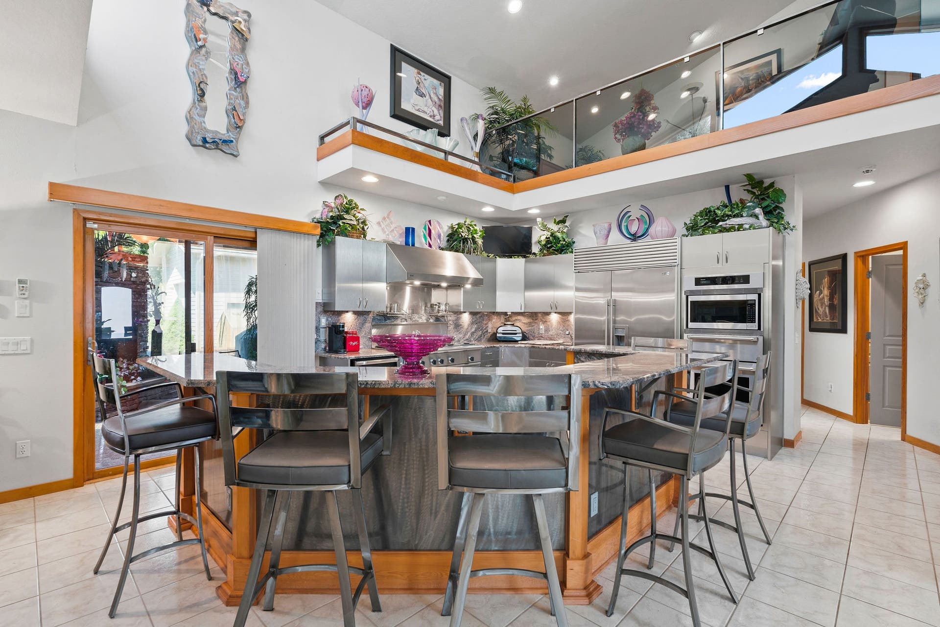 229 Harbor Drive, Bigfork, MT 59911 Beautiful granite bar top with custom welded barstools and stainless-steel paneling