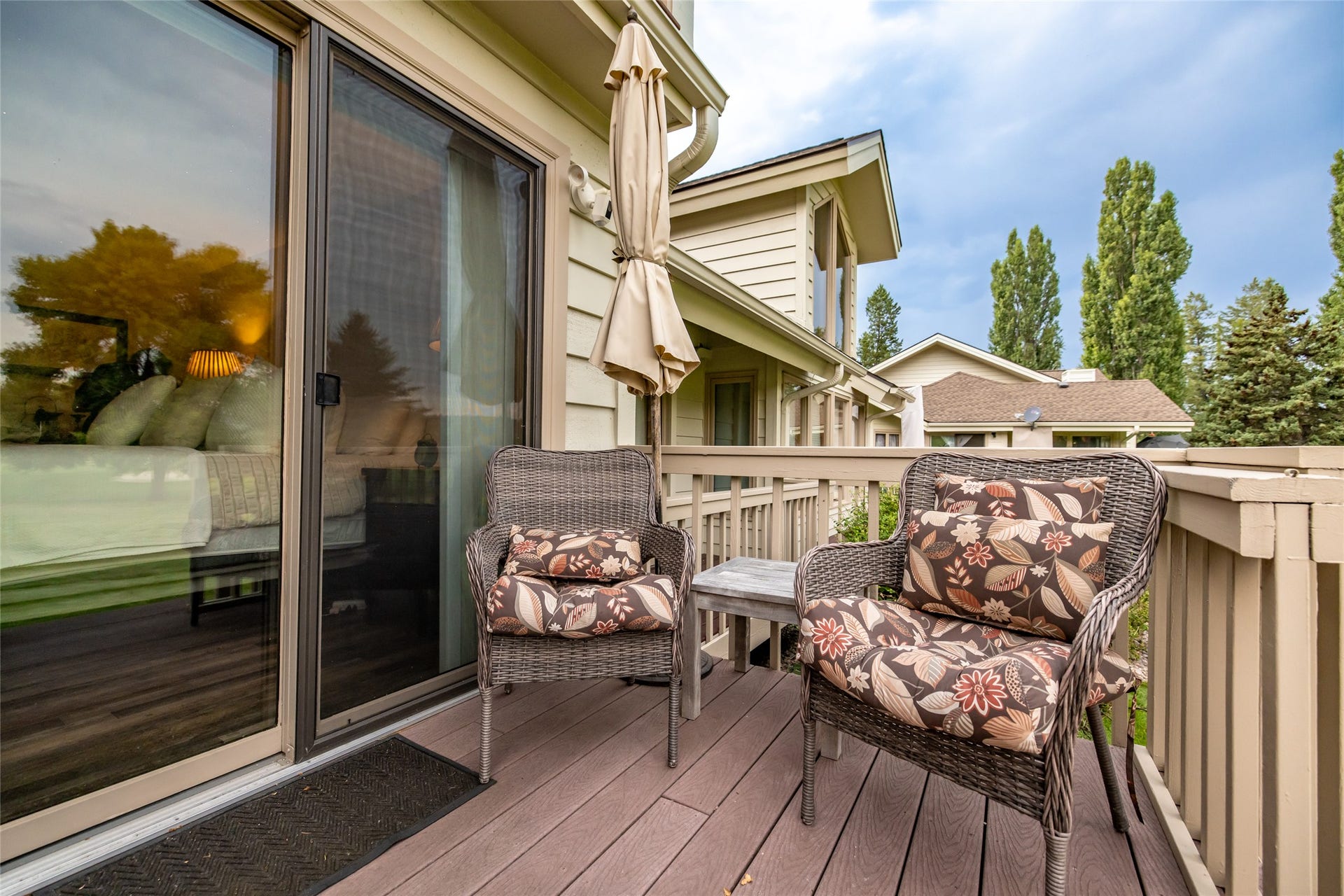 183 Golf Terrace, #B, Bigfork, MT 59911 Deck off of the main floor primary bedroom.