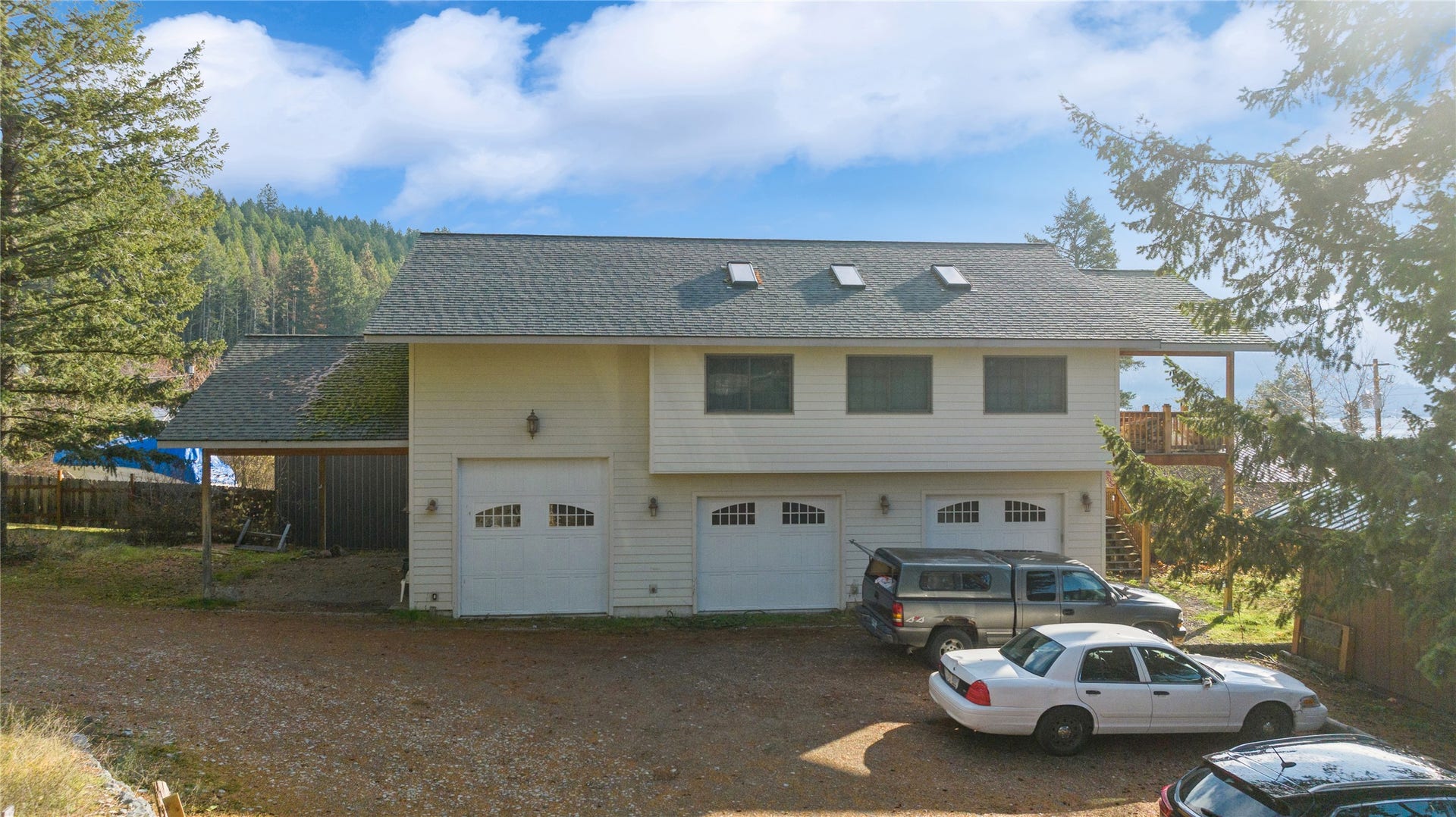 15236 Mt Highway 35, Bigfork, MT 59911 Looking N to S at guest quarters and attached 3 car garage.