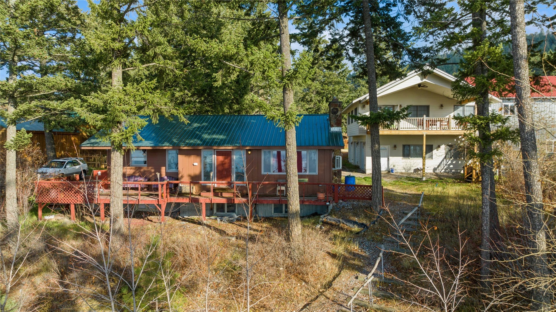 15236 Mt Highway 35, Bigfork, MT 59911 Looking W from lake to main original residence.