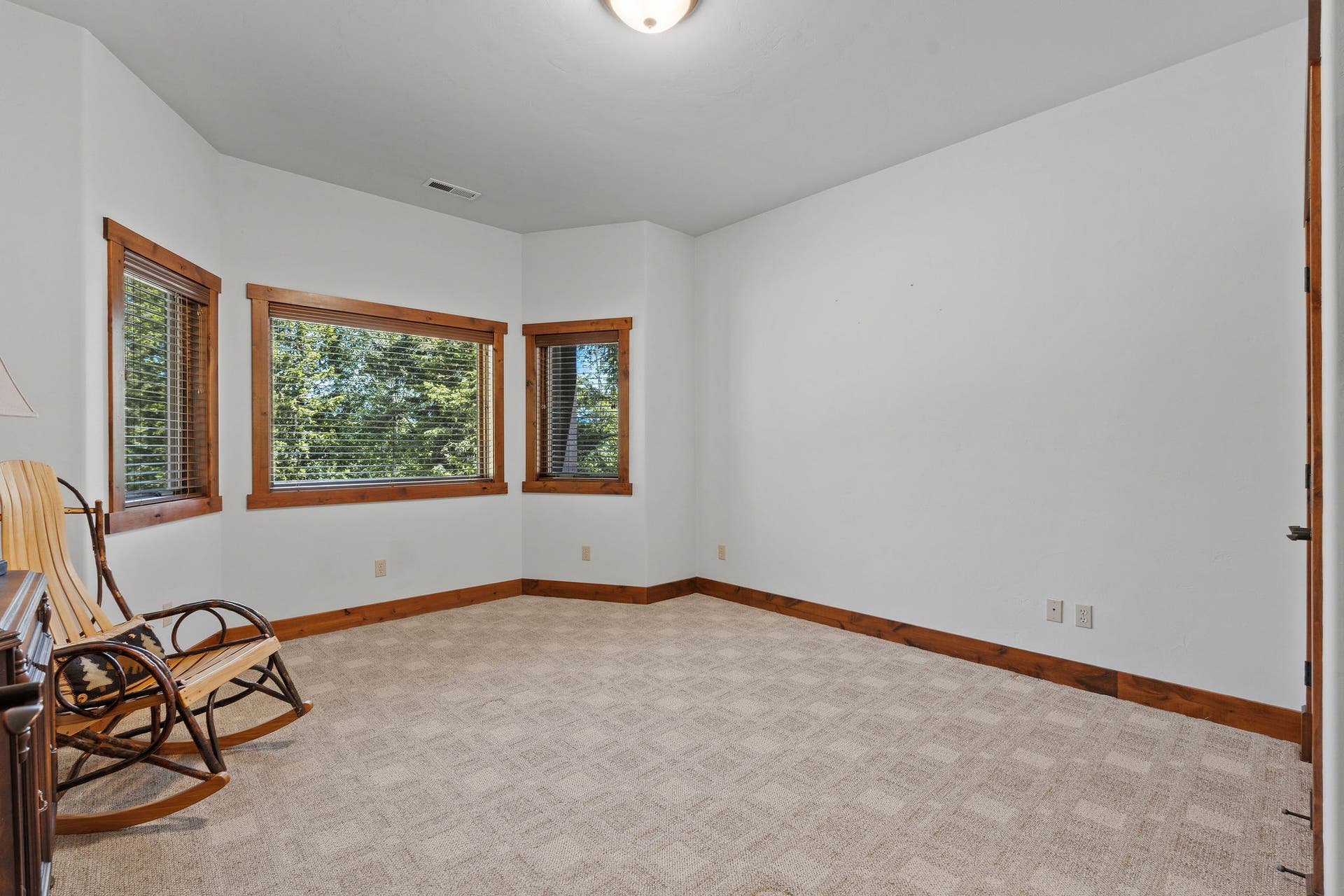 129 Bjork Drive, Bigfork, MT 59911 Lower level guest bedroom #2 with bay window