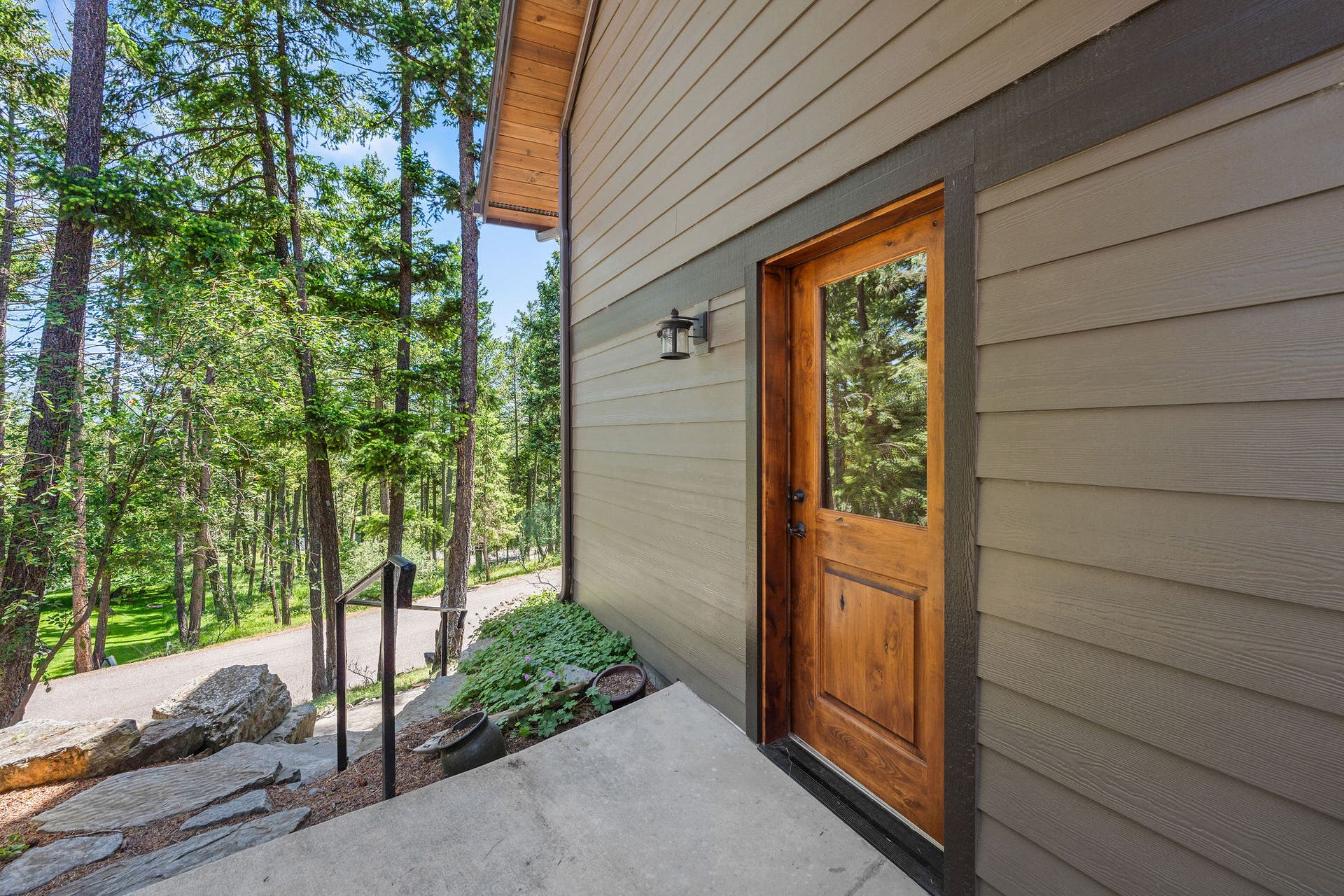 129 Bjork Drive, Bigfork, MT 59911 Lower level exit off utility room