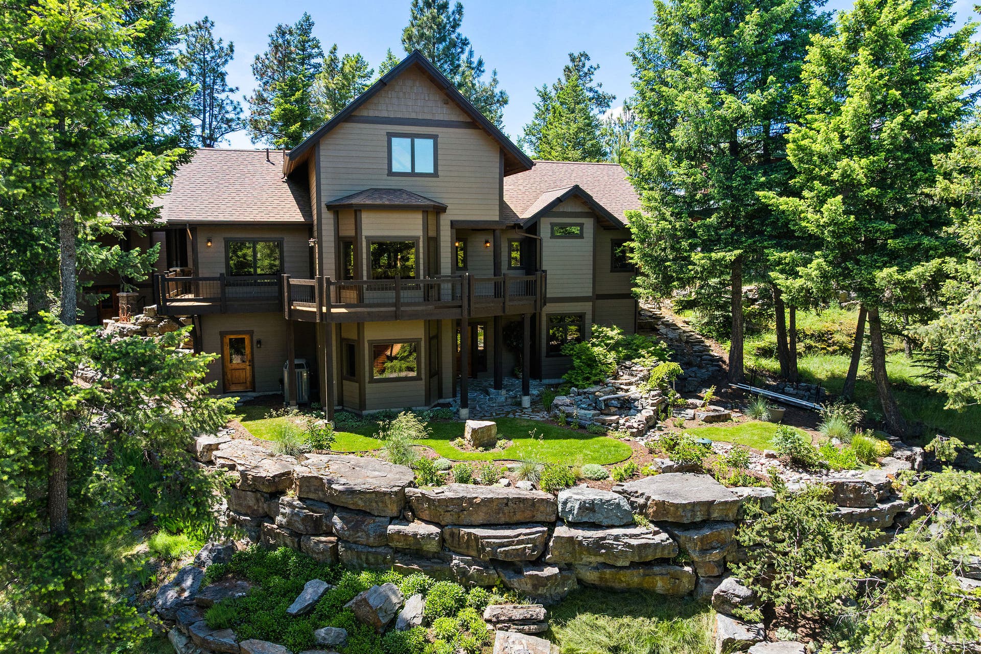 129 Bjork Drive, Bigfork, MT 59911 Beautifully landscaped with boulders