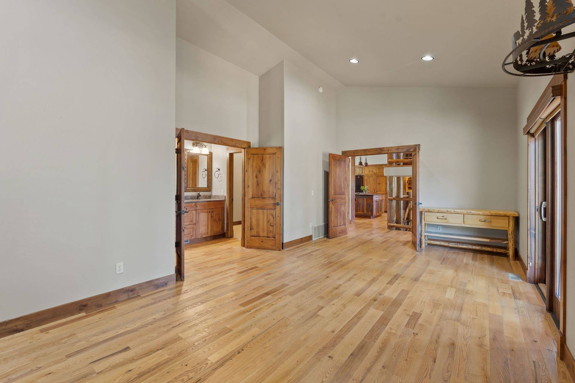 129 Bjork Drive, Bigfork, MT 59911 Double french doors into bedroom & bathroom