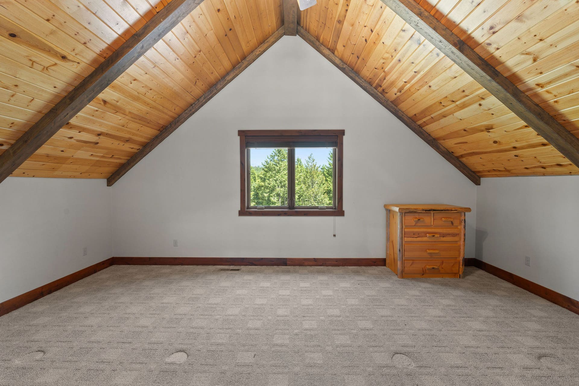 129 Bjork Drive, Bigfork, MT 59911 Carpeted, vaulted T&G pine ceiling